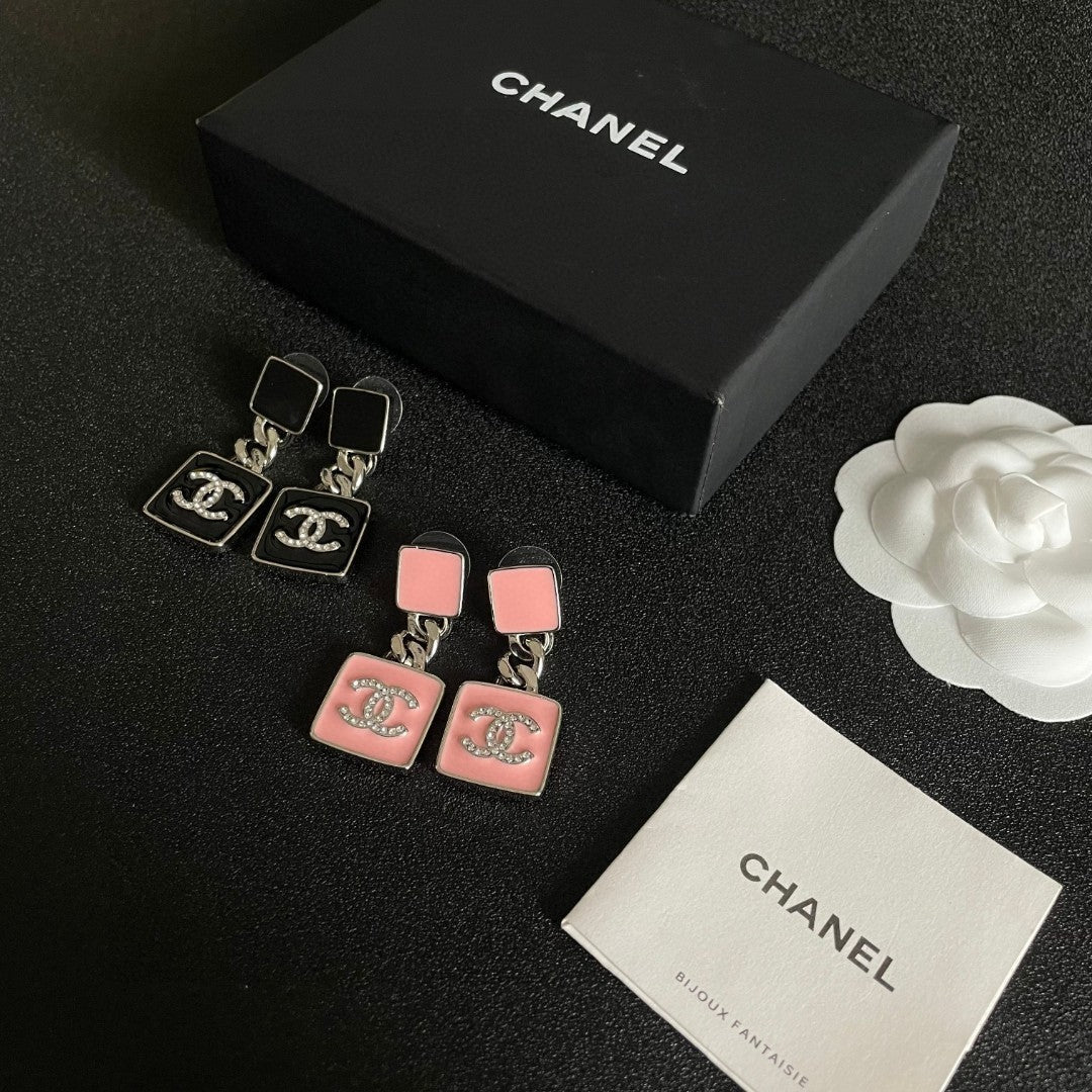 Martin Graham earrings in polished metal-tone – close-up detail