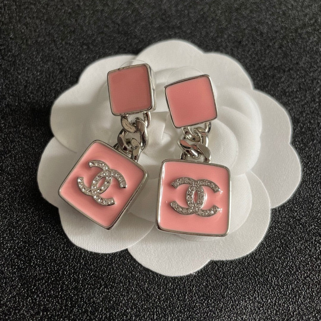Martin Graham earrings in polished metal-tone – front product view