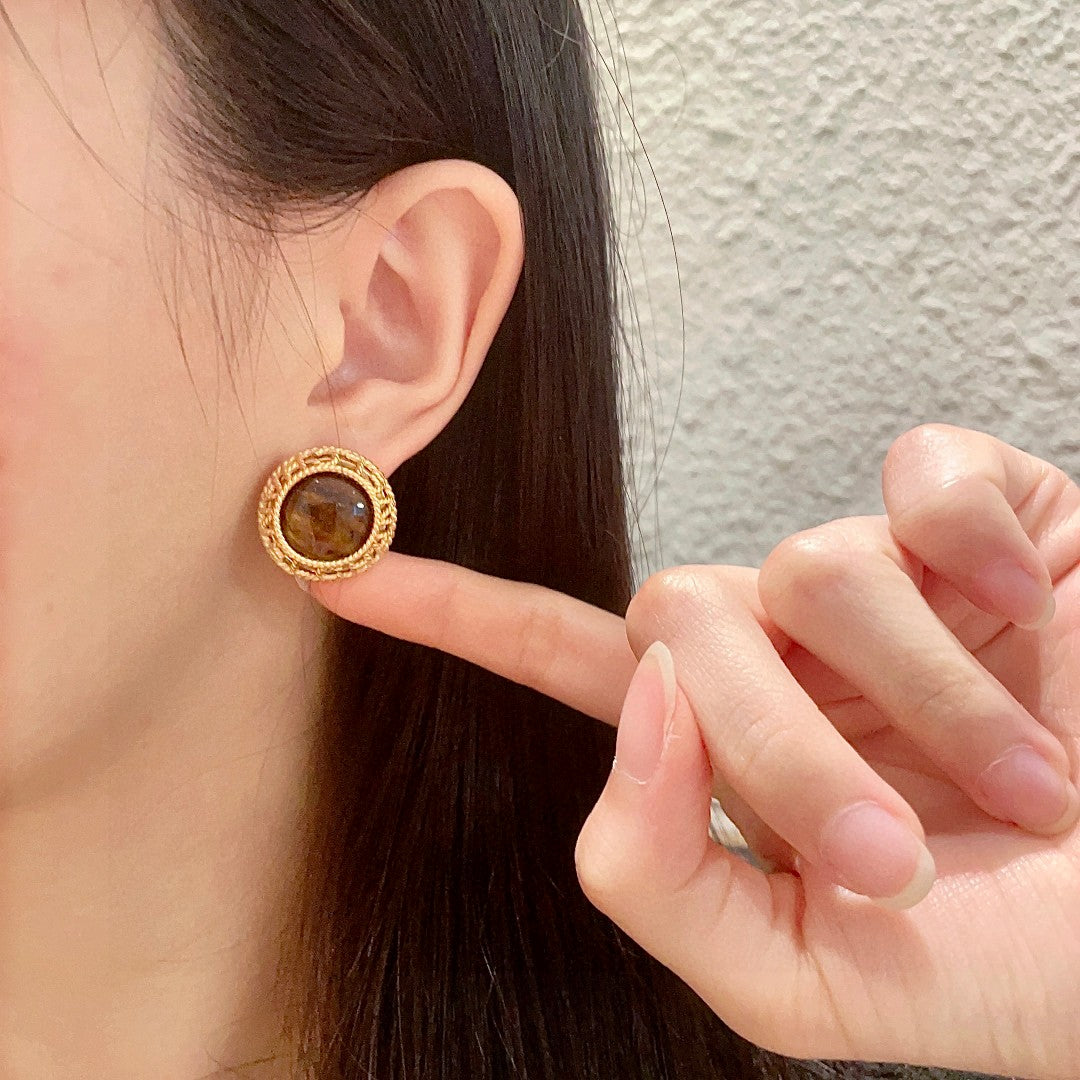 Martin Graham stud earrings in polished metal-tone – front product view
