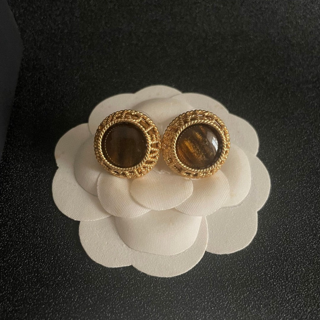Martin Graham stud earrings in polished metal-tone – detail view