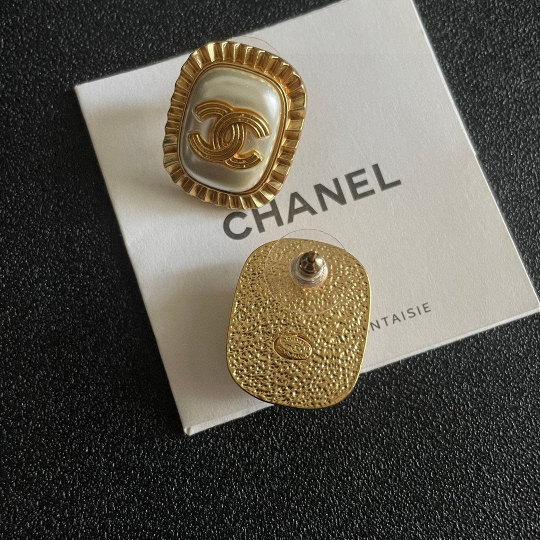Martin Graham stud earrings in polished metal-tone – main product view