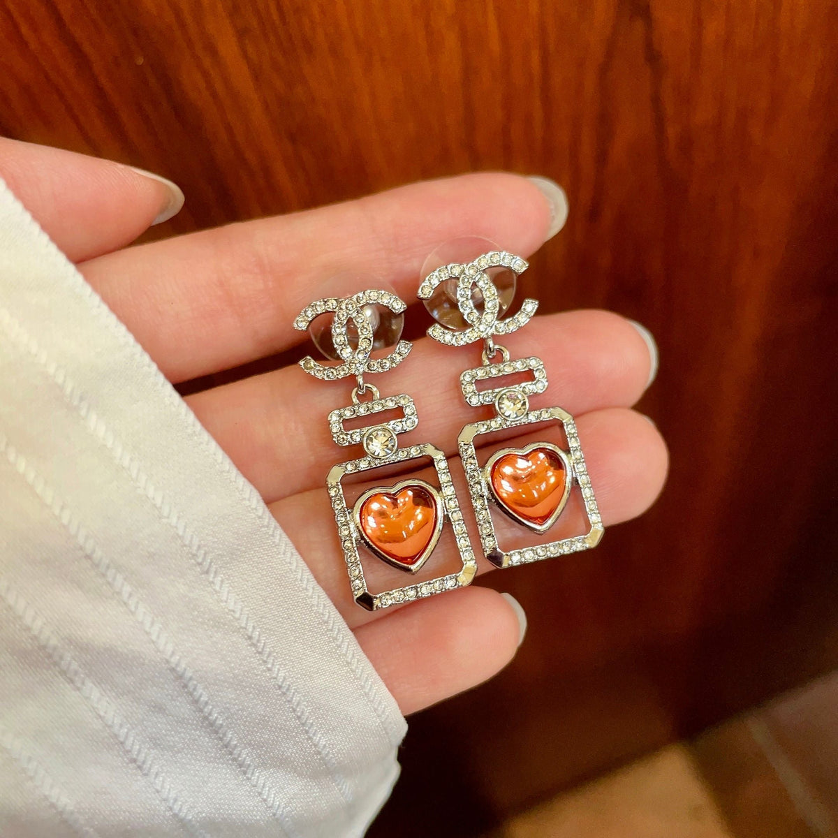 Martin Graham earrings in polished metal-tone – side detail