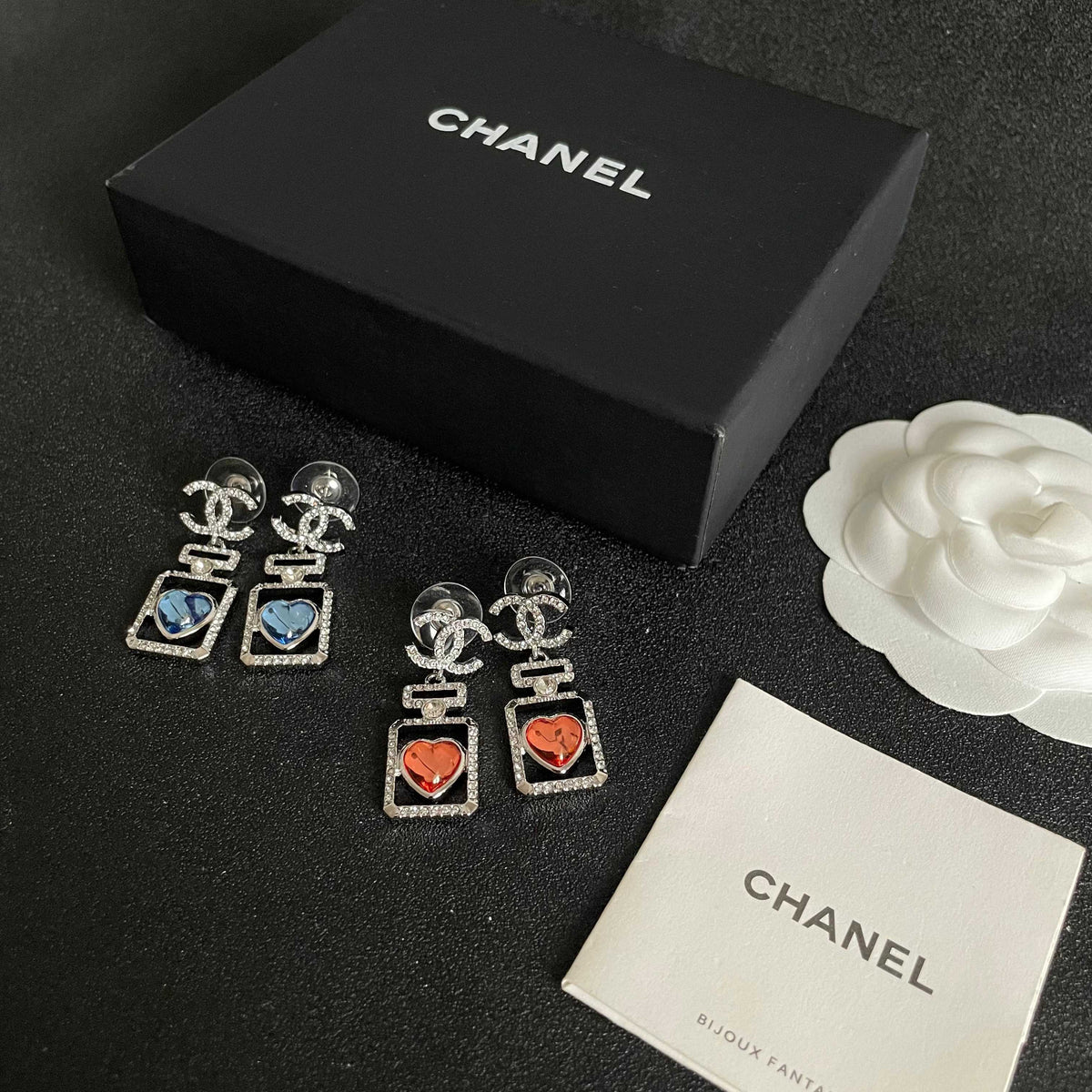 Martin Graham earrings in polished metal-tone – close-up detail