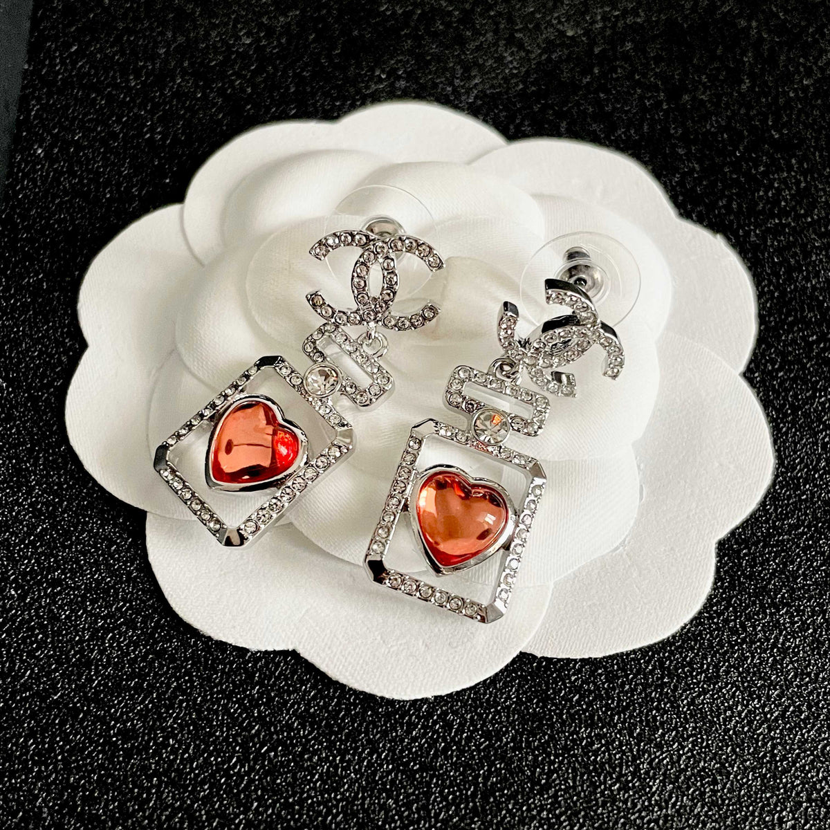 Martin Graham earrings in polished metal-tone – front product view