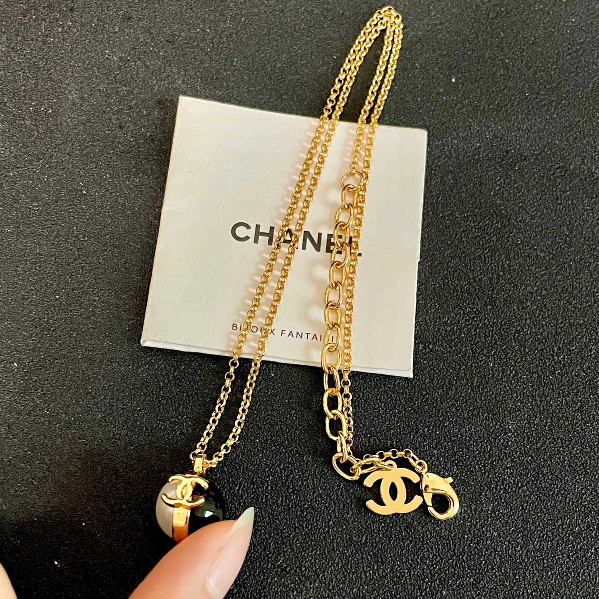 Martin Graham pendant necklace in polished metal-tone – detail view
