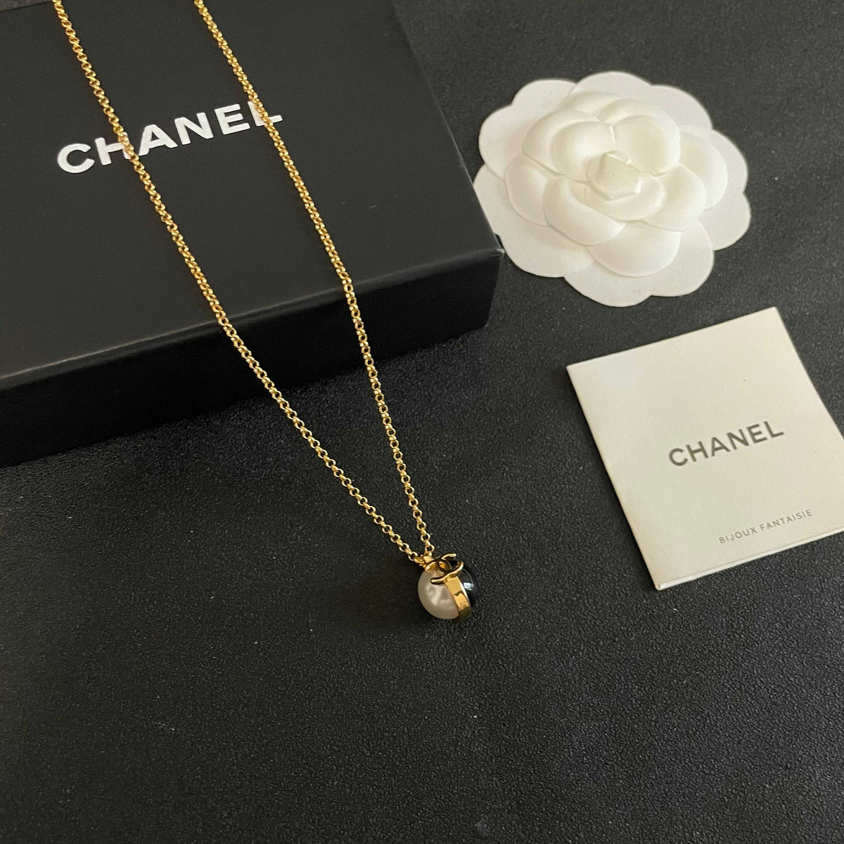 Martin Graham pendant necklace in polished metal-tone – styled product view