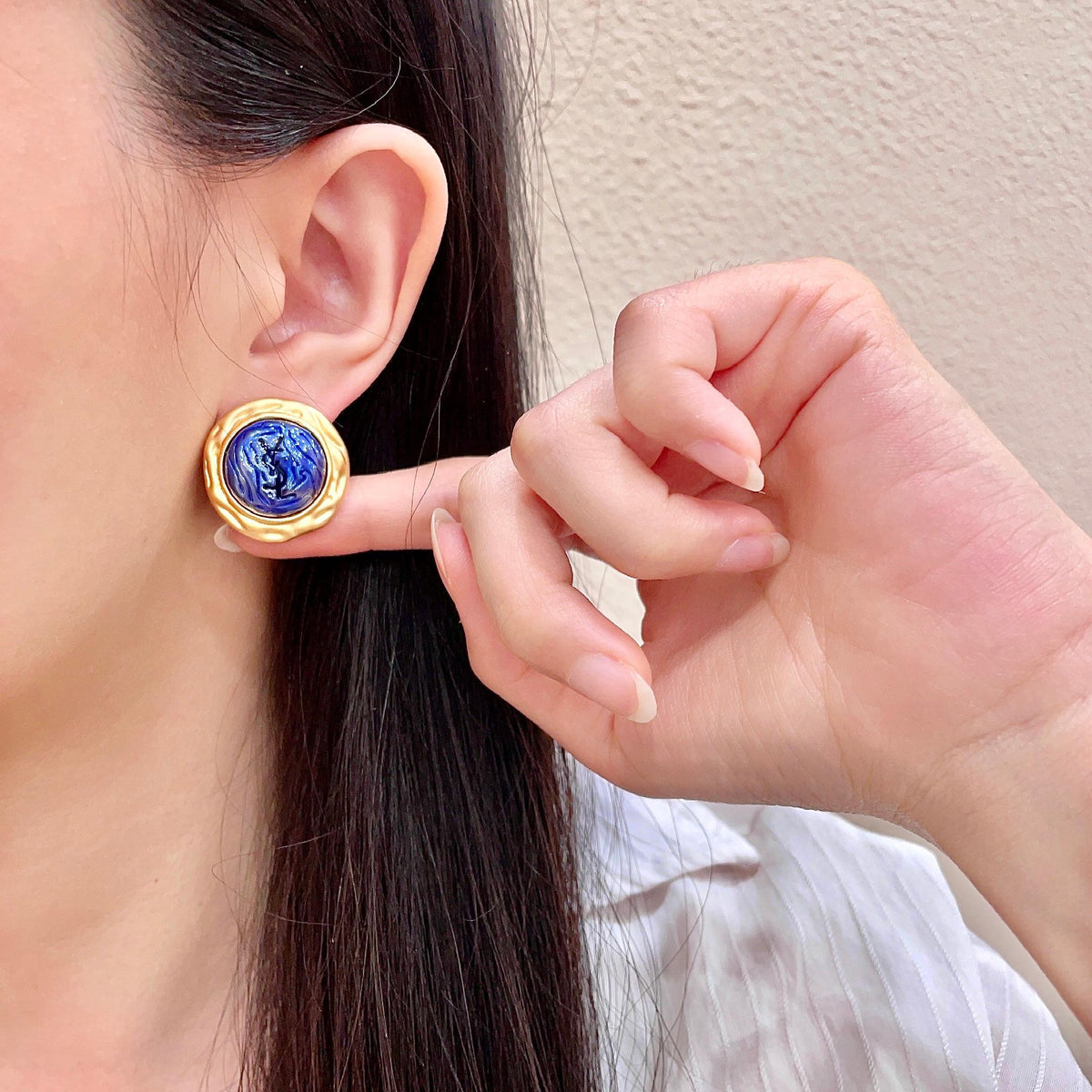 Martin Graham stud earrings in polished metal-tone – front product view