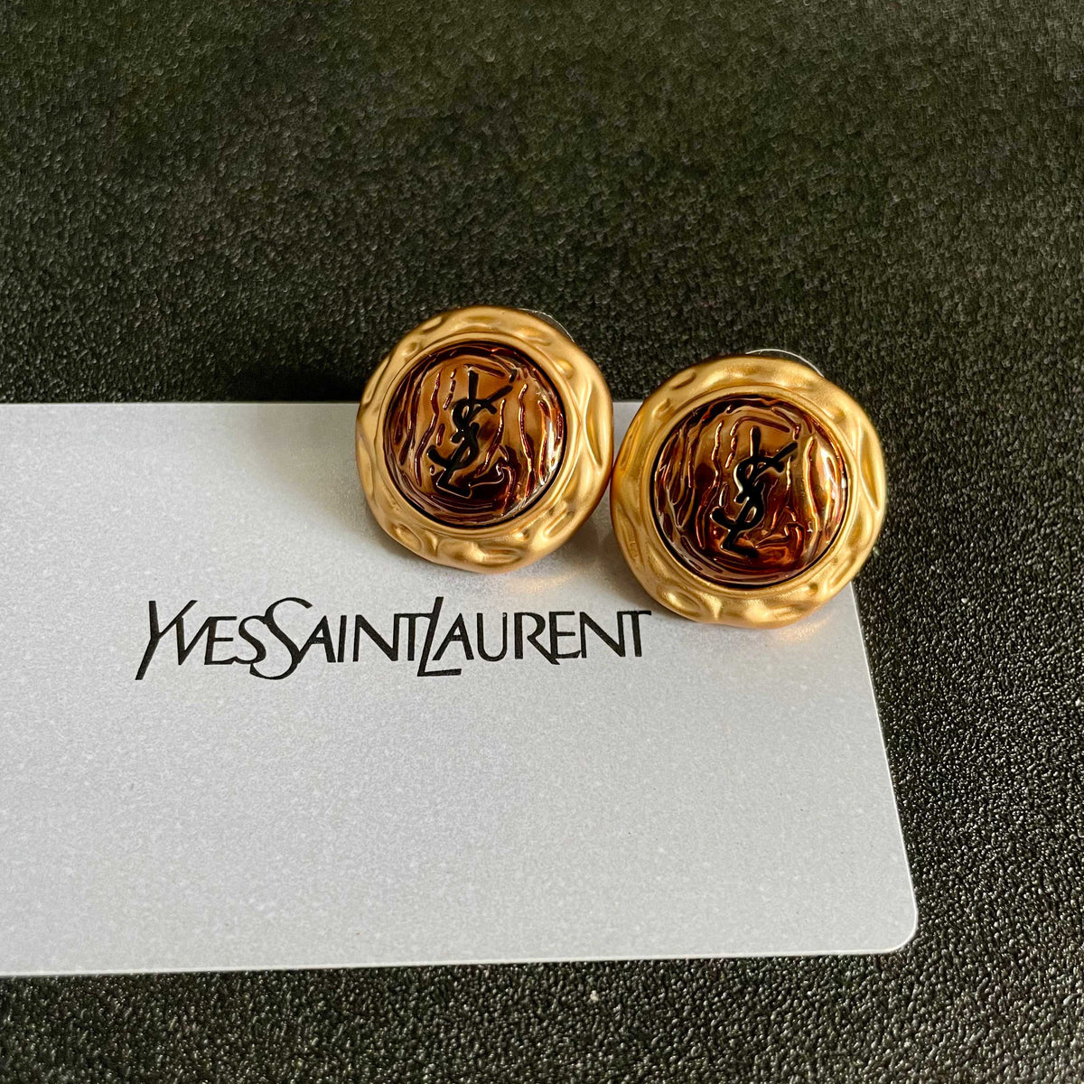 Martin Graham stud earrings in polished metal-tone – front product view