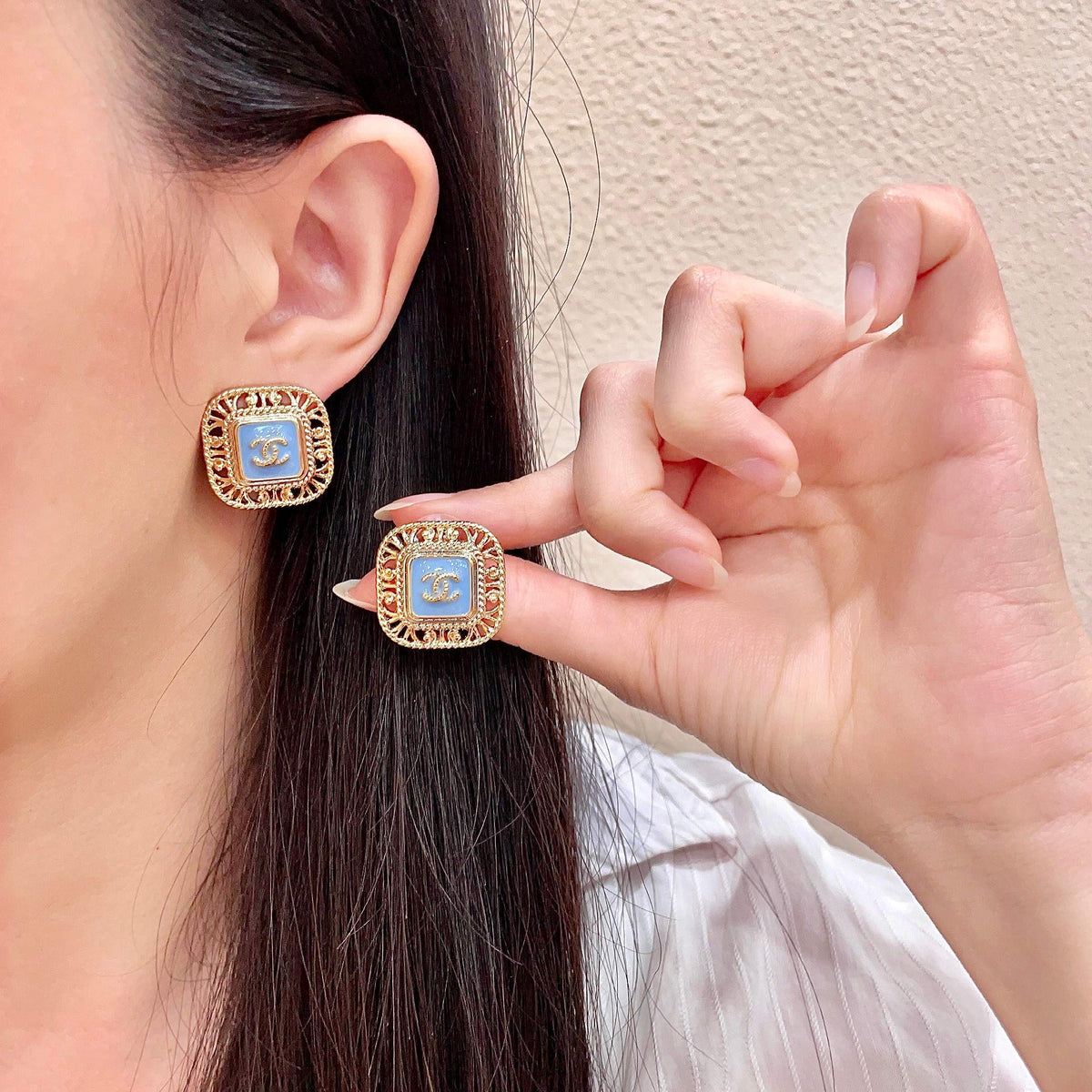 Martin Graham stud earrings in polished metal-tone – main product view
