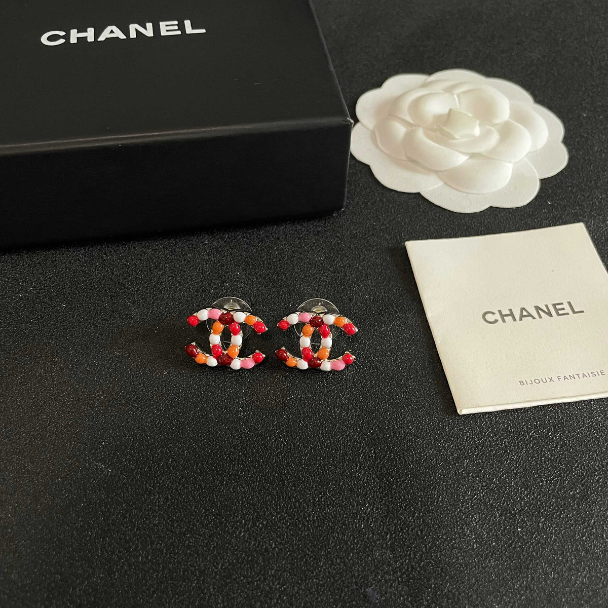 Martin Graham stud earrings in polished metal-tone – styled product view