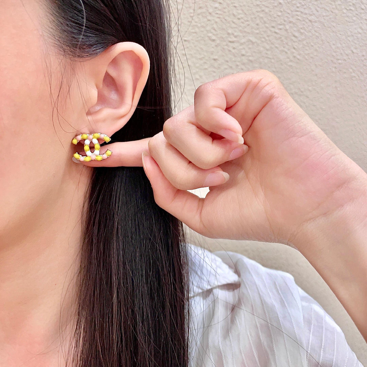 Martin Graham stud earrings in polished metal-tone – front product view