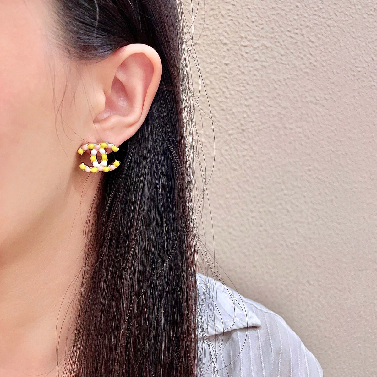Martin Graham stud earrings in polished metal-tone – detail view