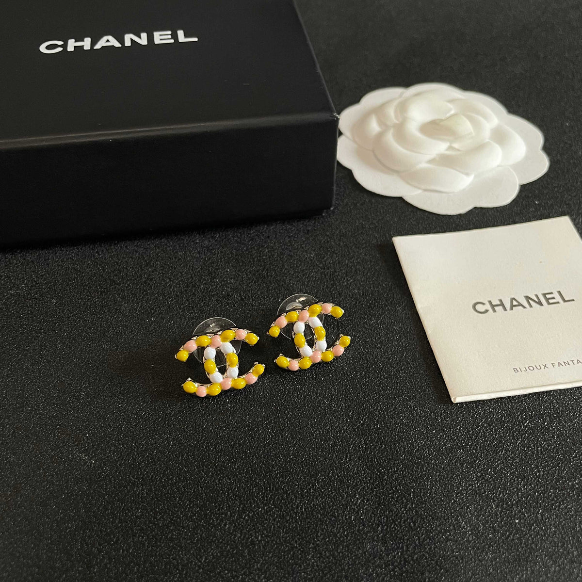 Martin Graham stud earrings in polished metal-tone – styled product view