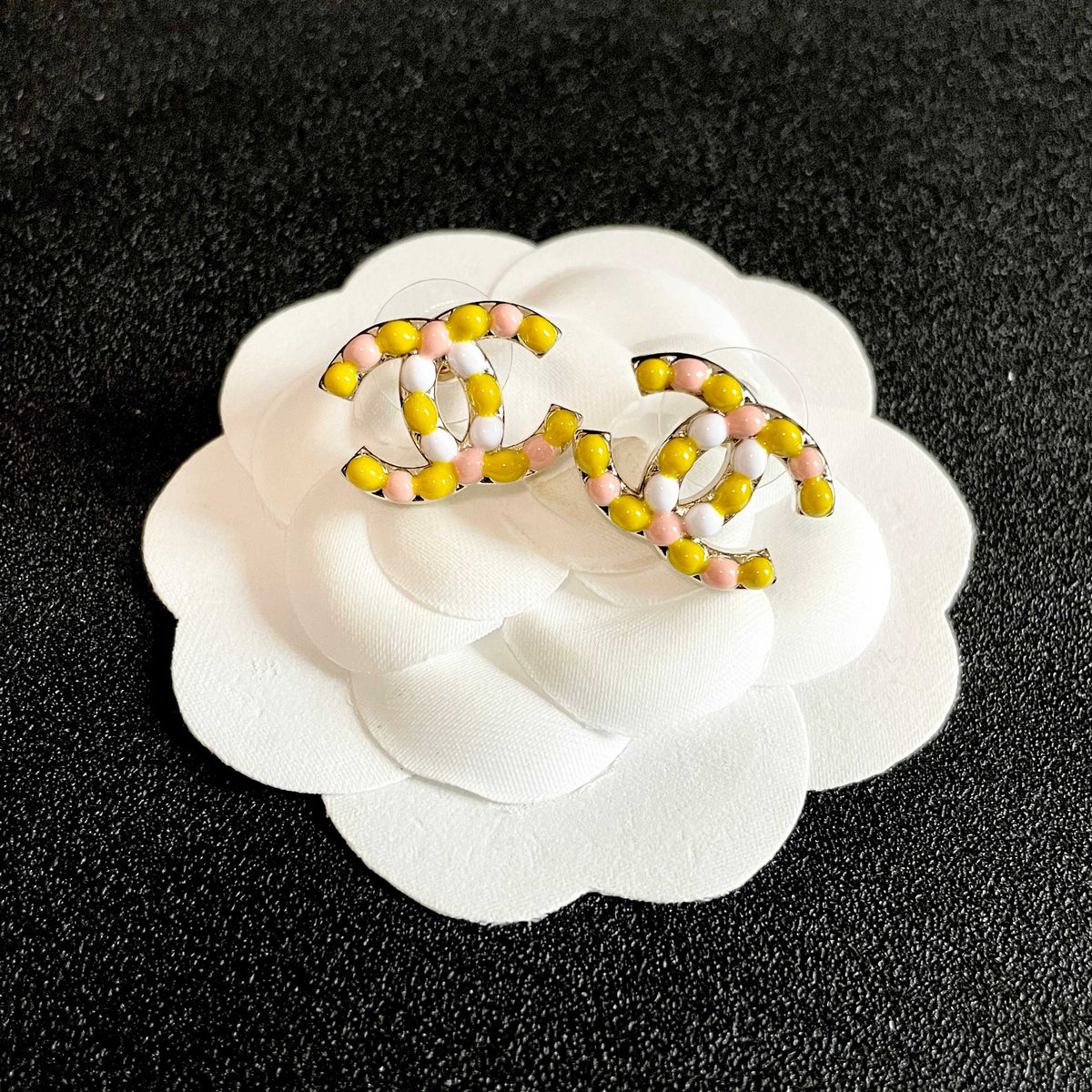 Martin Graham stud earrings in polished metal-tone – front product view