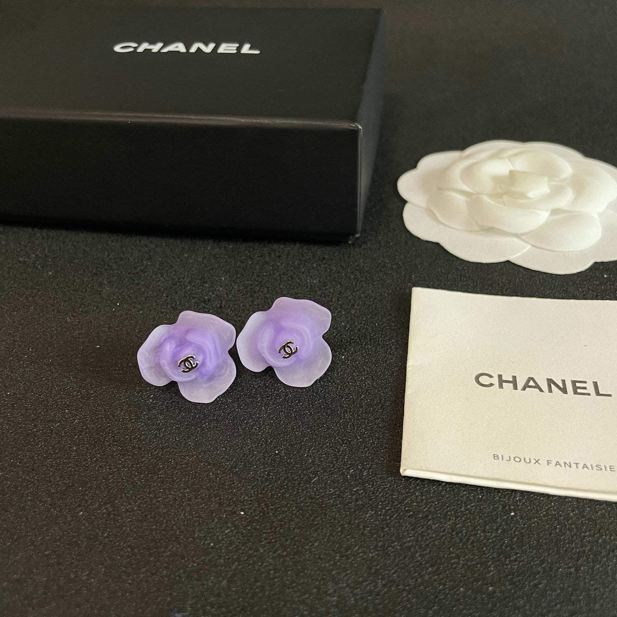 Martin Graham stud earrings in polished metal-tone – close-up detail
