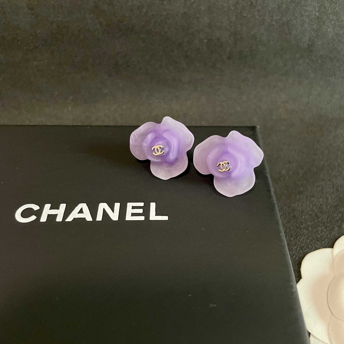Martin Graham stud earrings in polished metal-tone – detail view