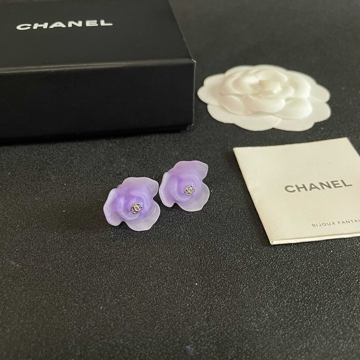 Martin Graham stud earrings in polished metal-tone – styled product view