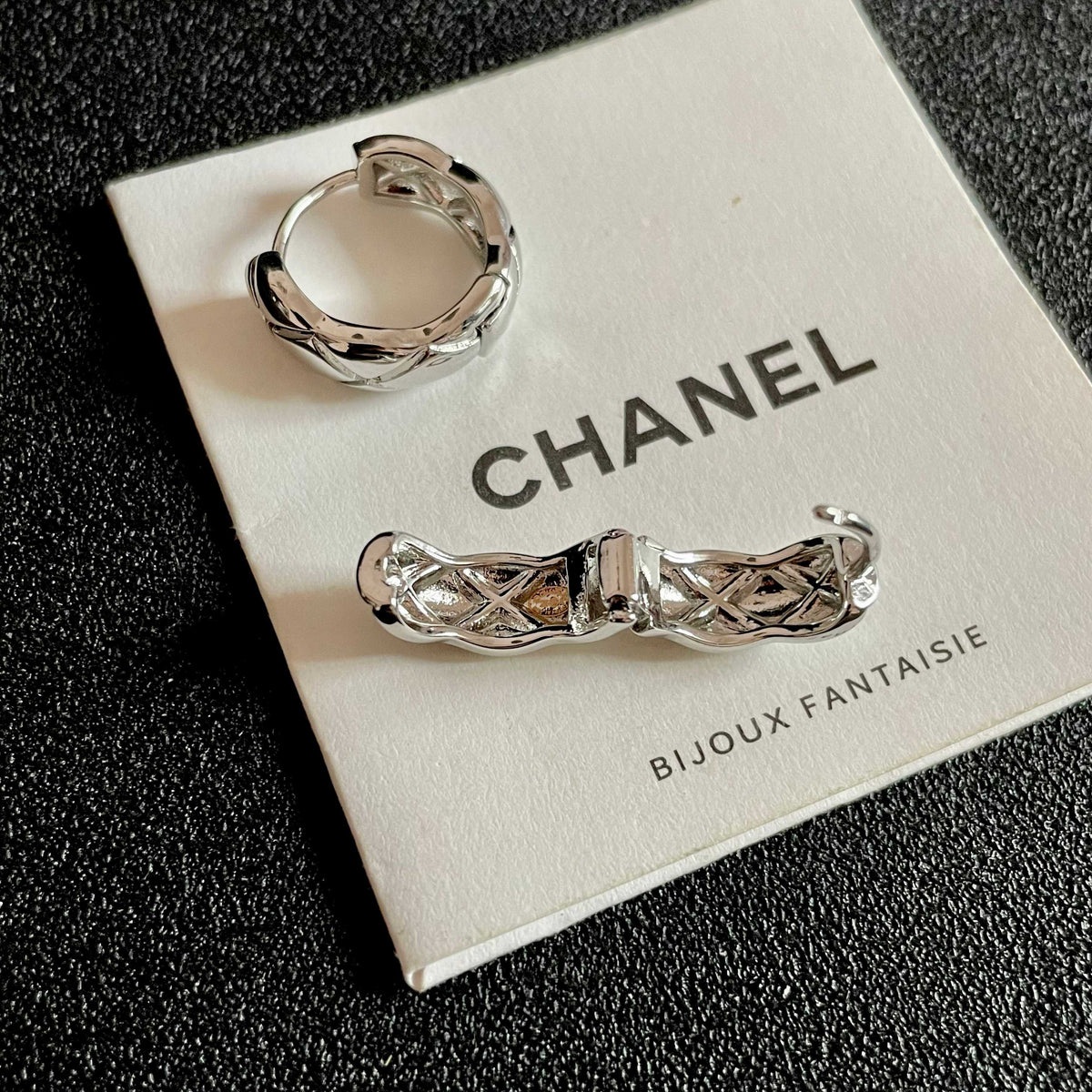 Martin Graham stud earrings in polished metal-tone – main product view