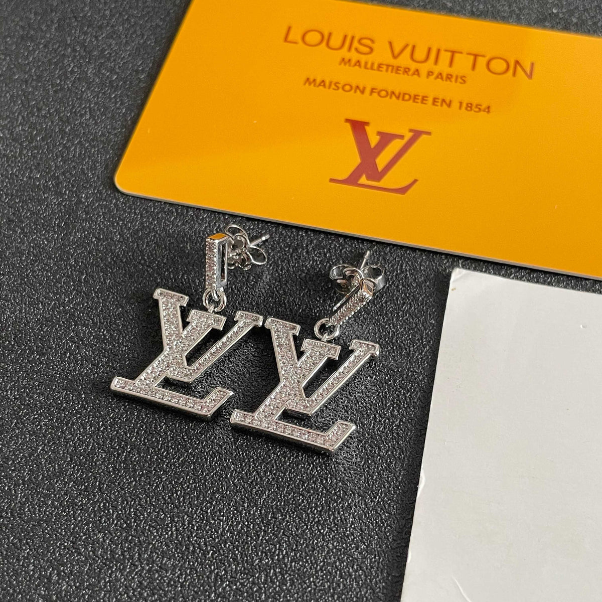 Martin Graham stud earrings in polished metal-tone – main product view