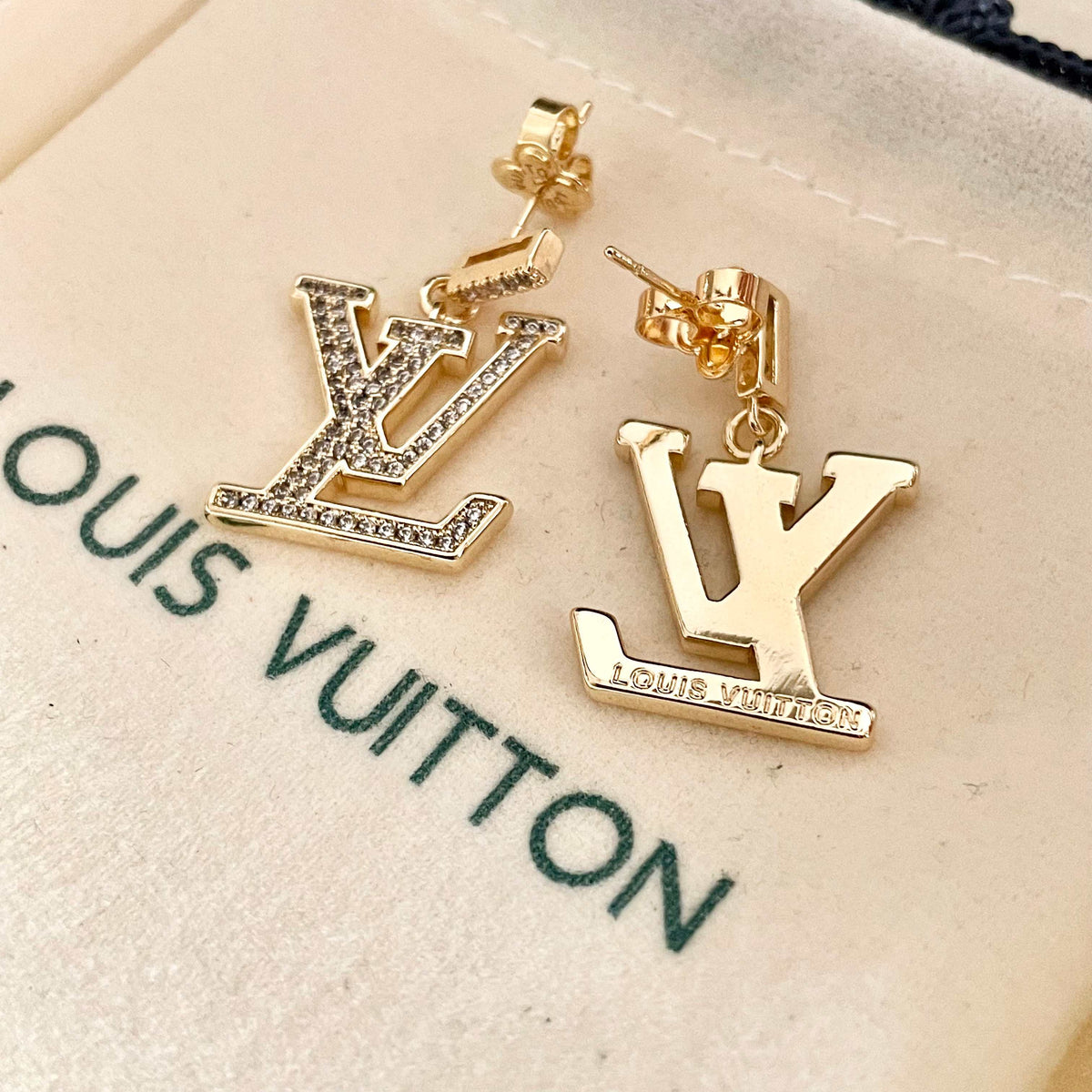 Martin Graham stud earrings in polished metal-tone – front product view