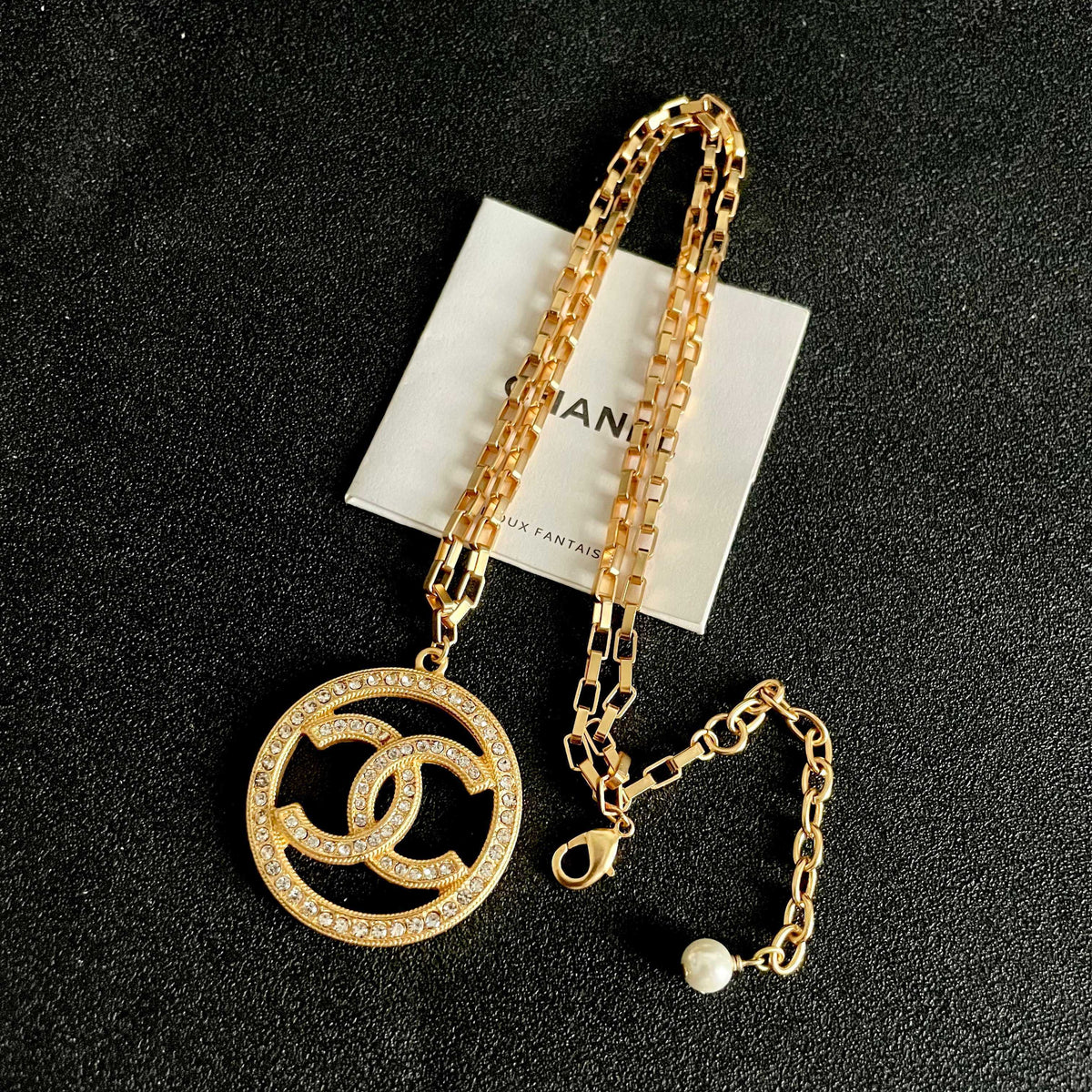 Martin Graham pendant necklace in polished metal-tone – detail view