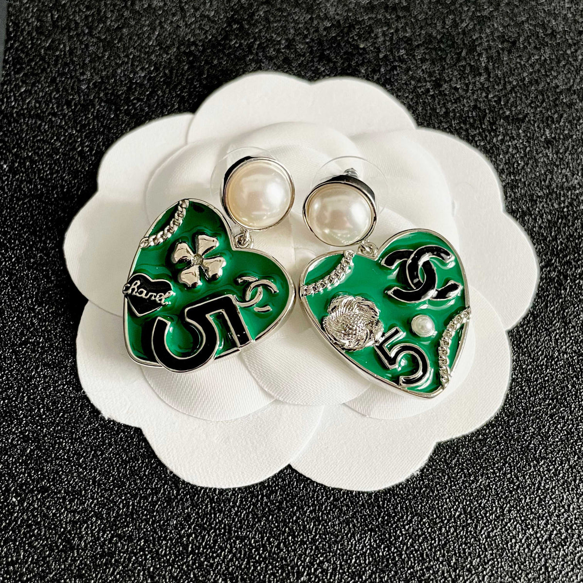 Martin Graham earrings in polished metal-tone – front product view