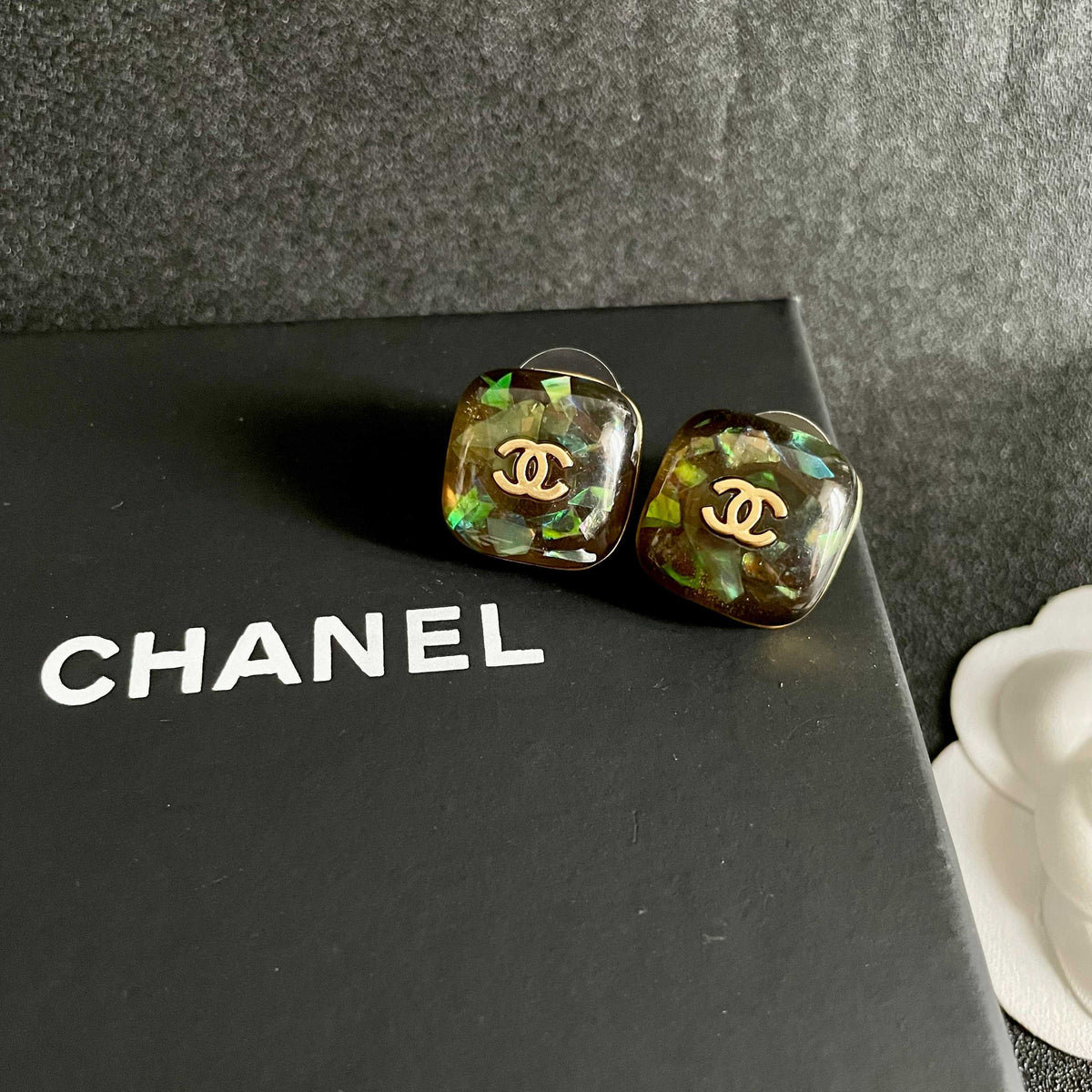 Martin Graham stud earrings in polished metal-tone – detail view