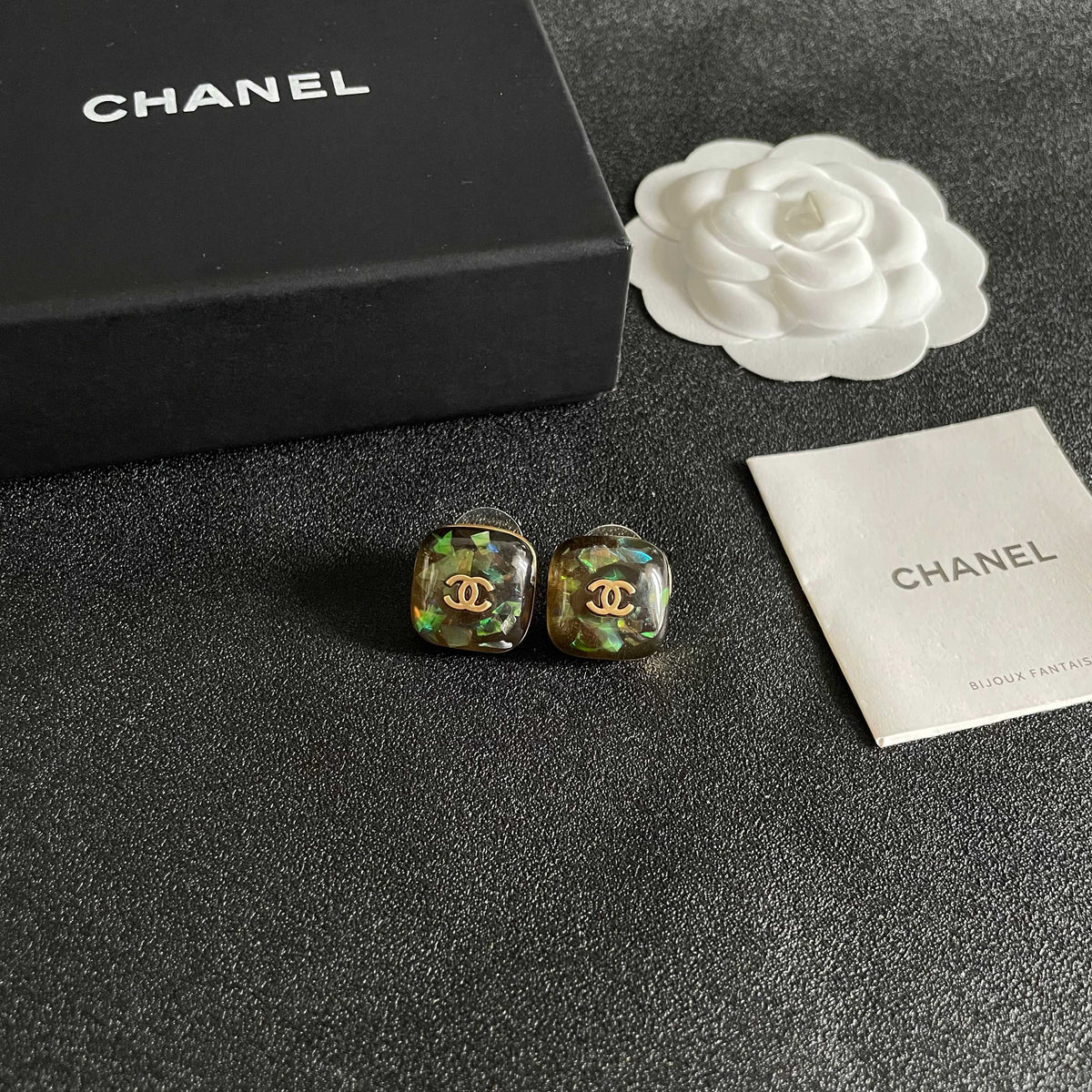 Martin Graham stud earrings in polished metal-tone – styled product view