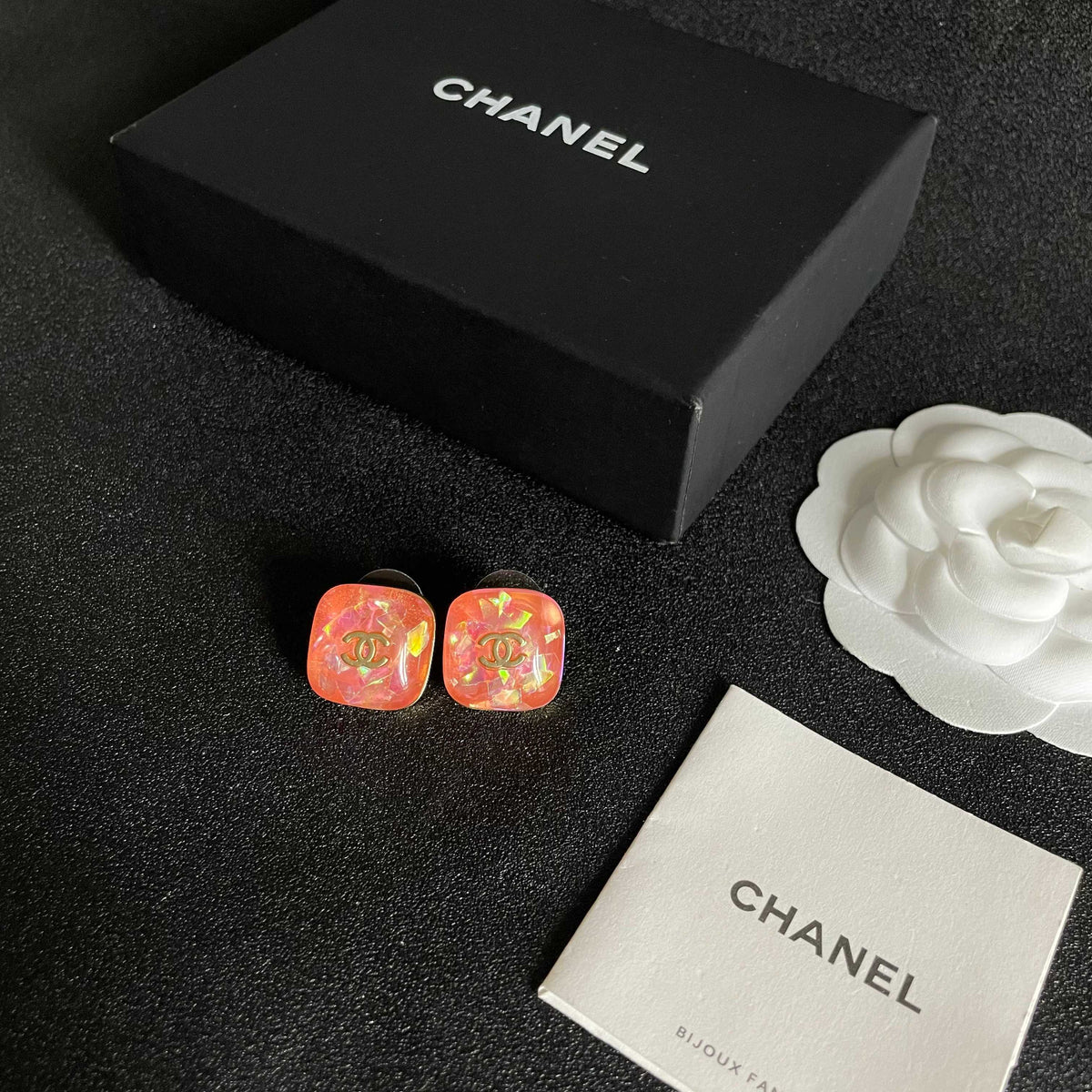Martin Graham stud earrings in polished metal-tone – close-up detail