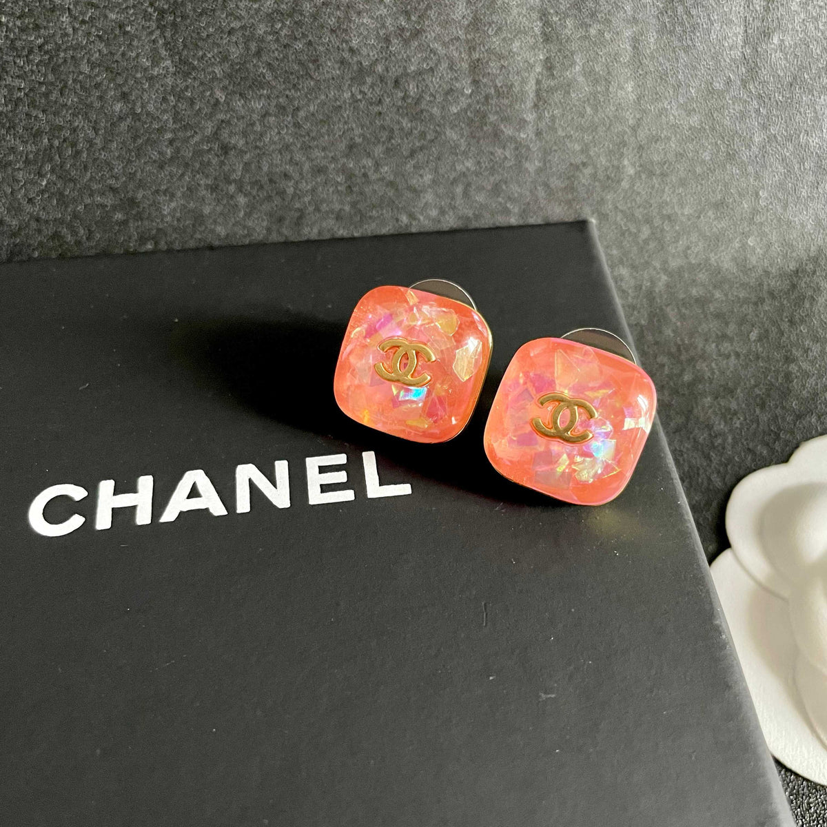 Martin Graham stud earrings in polished metal-tone – detail view