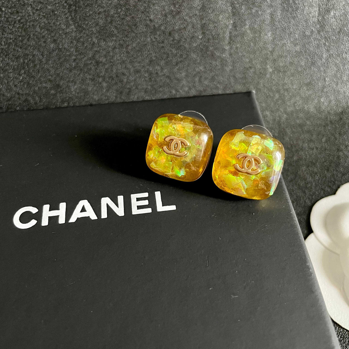 Martin Graham stud earrings in polished metal-tone – detail view