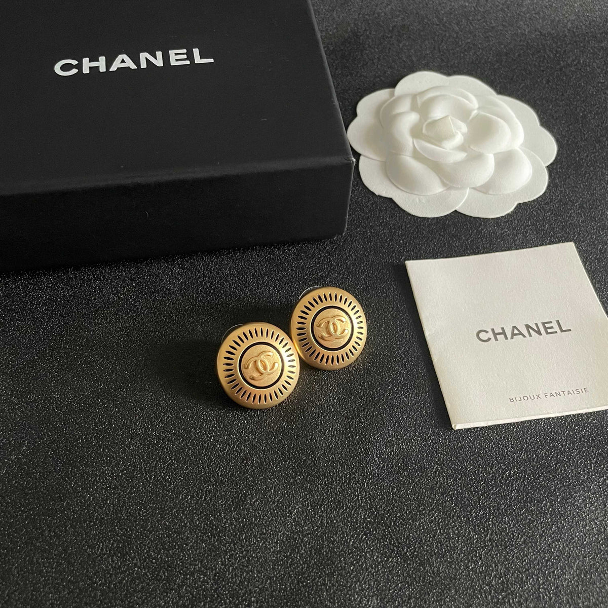 Martin Graham stud earrings in polished metal-tone – styled product view