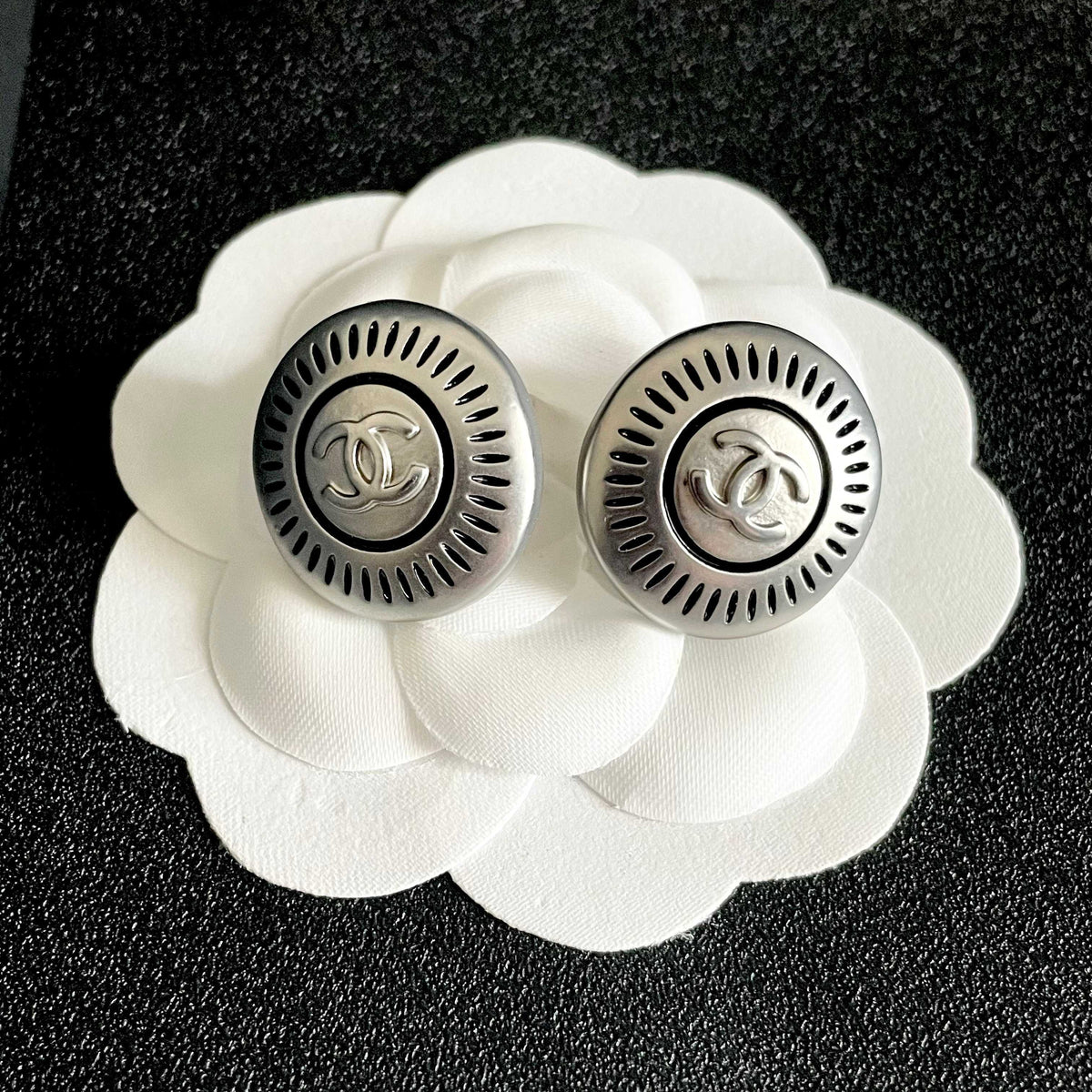 Martin Graham stud earrings in polished metal-tone – front product view