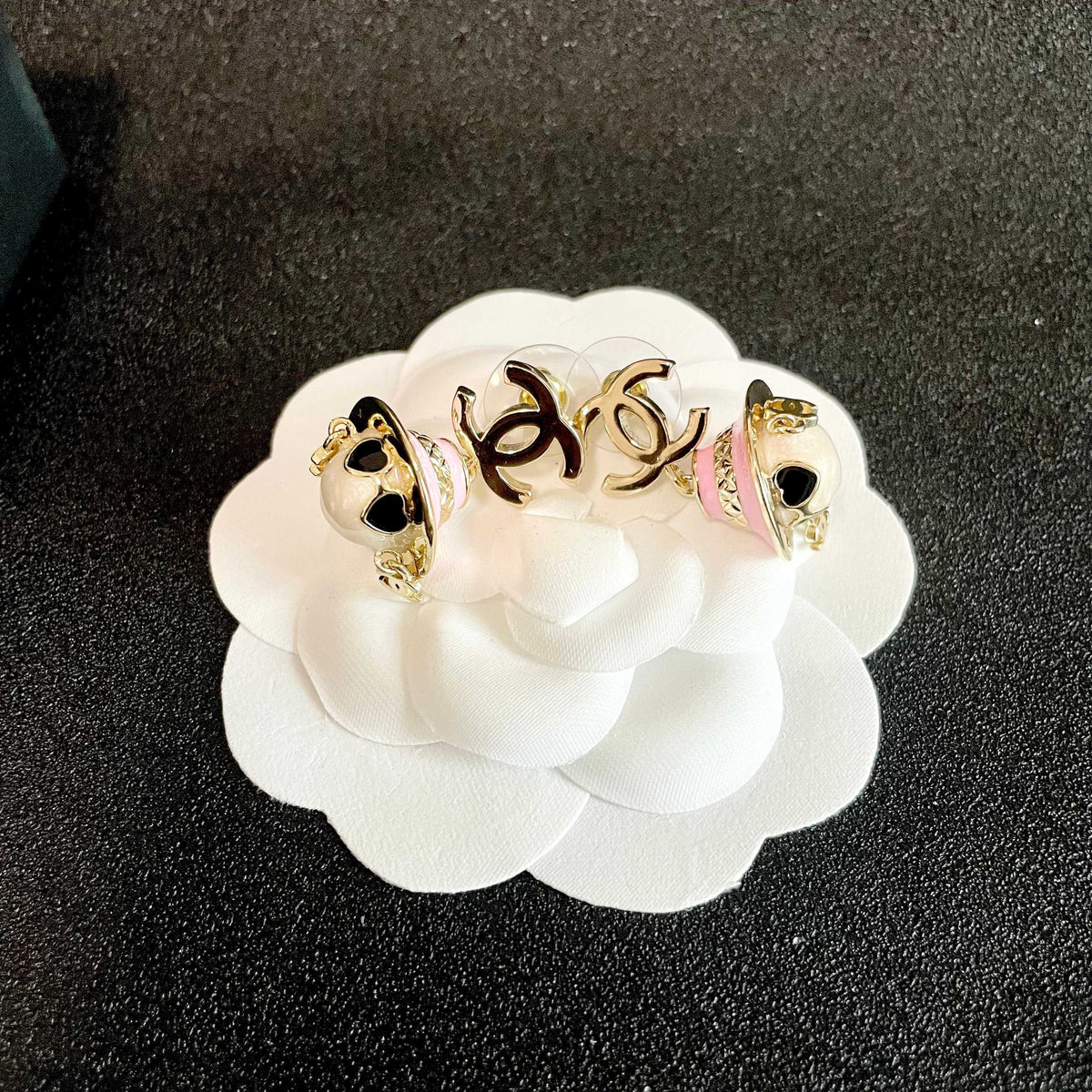 Martin Graham earrings in polished metal-tone – front product view