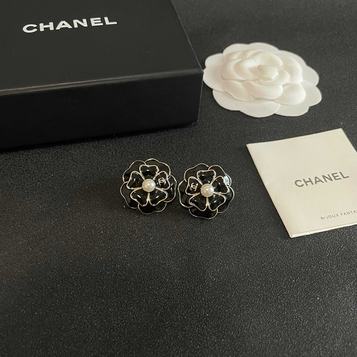 Martin Graham stud earrings in polished metal-tone – styled product view