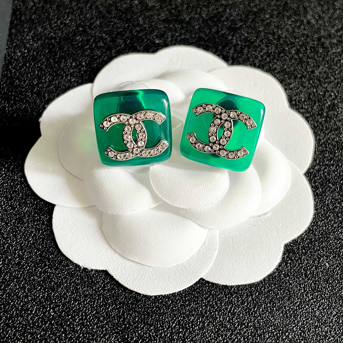 Martin Graham stud earrings in polished metal-tone – front product view