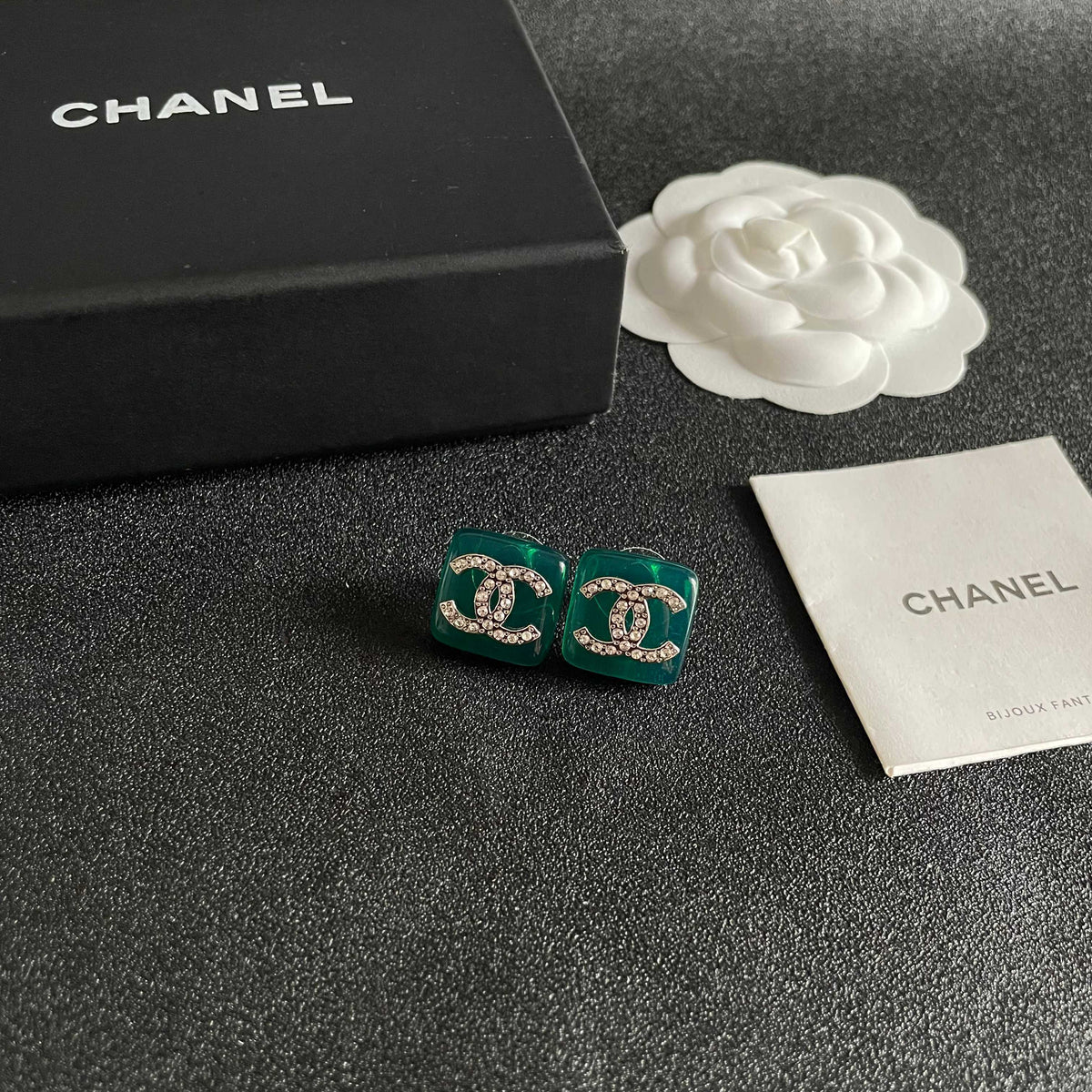 Martin Graham stud earrings in polished metal-tone – styled product view