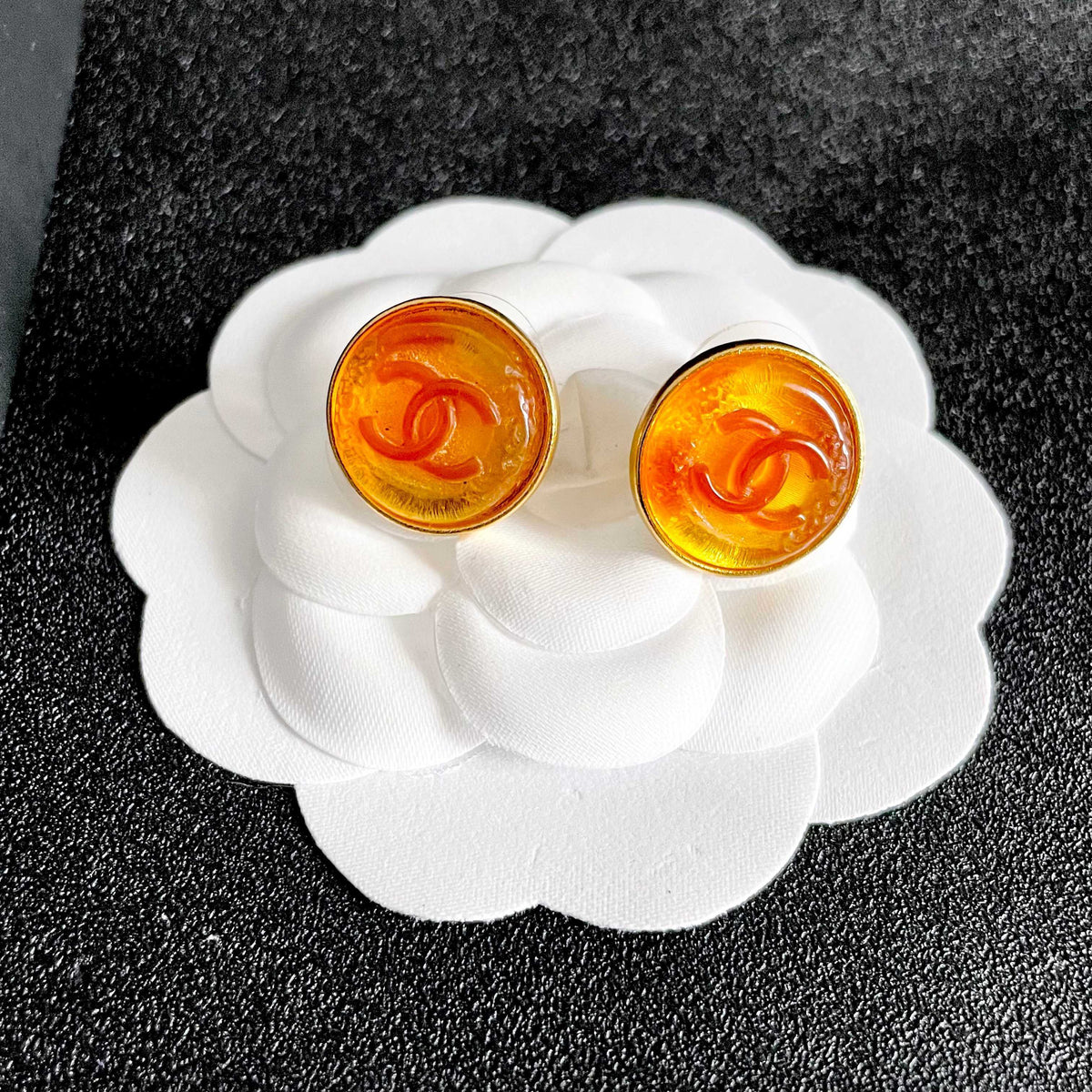 Martin Graham stud earrings in polished metal-tone – front product view