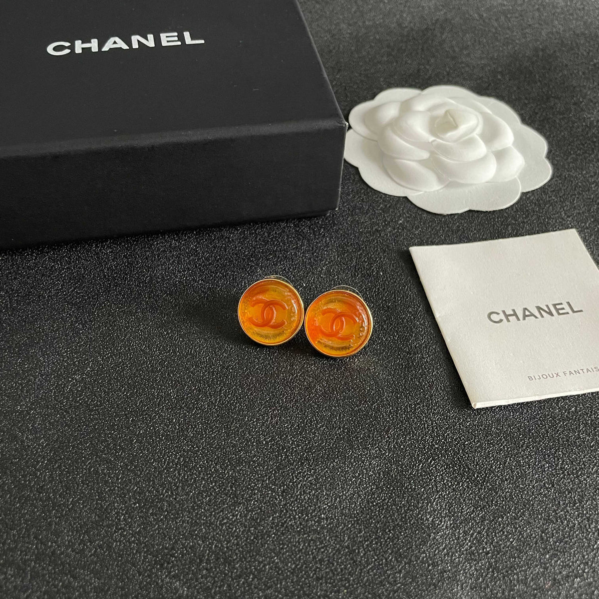 Martin Graham stud earrings in polished metal-tone – styled product view