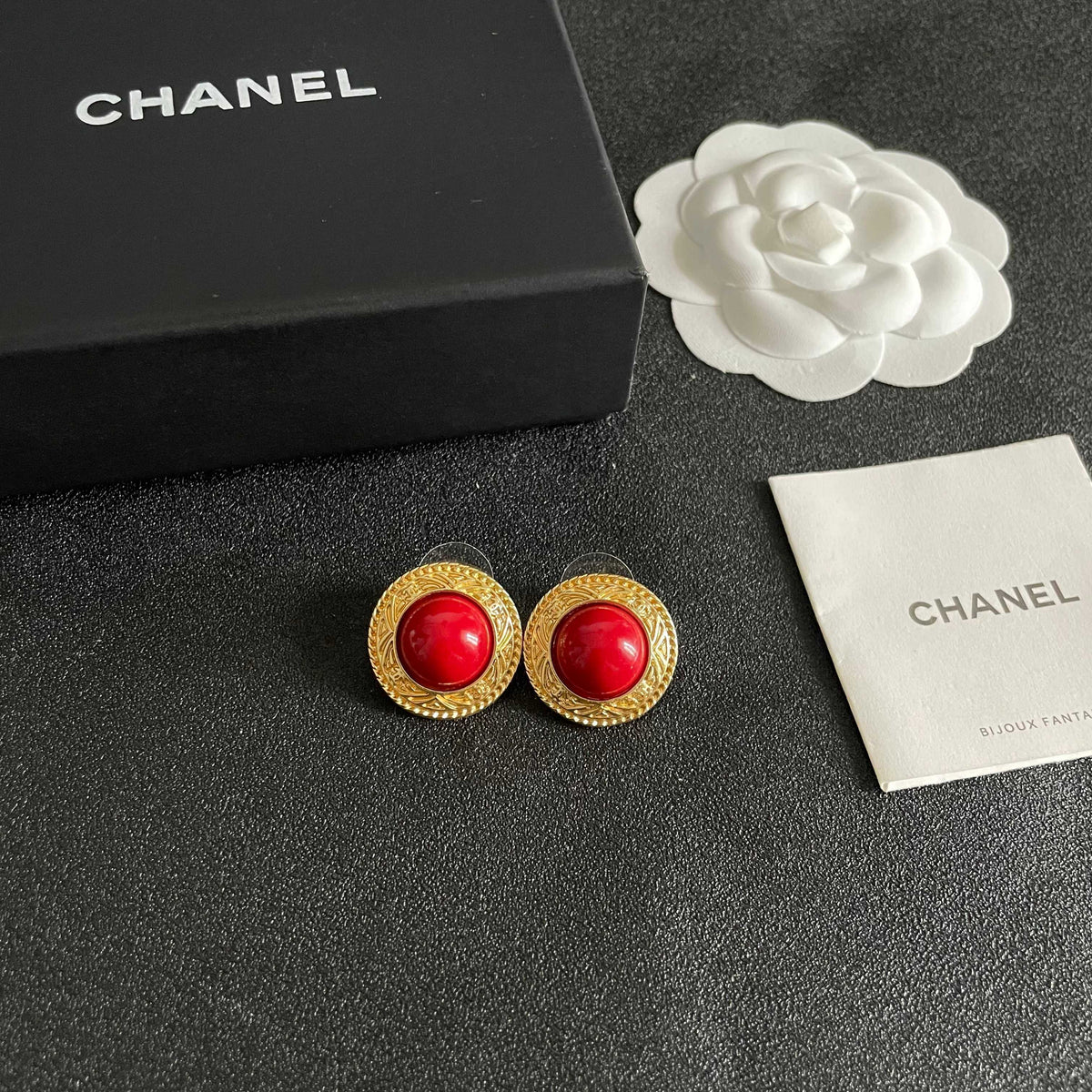 Martin Graham stud earrings in polished metal-tone – styled product view
