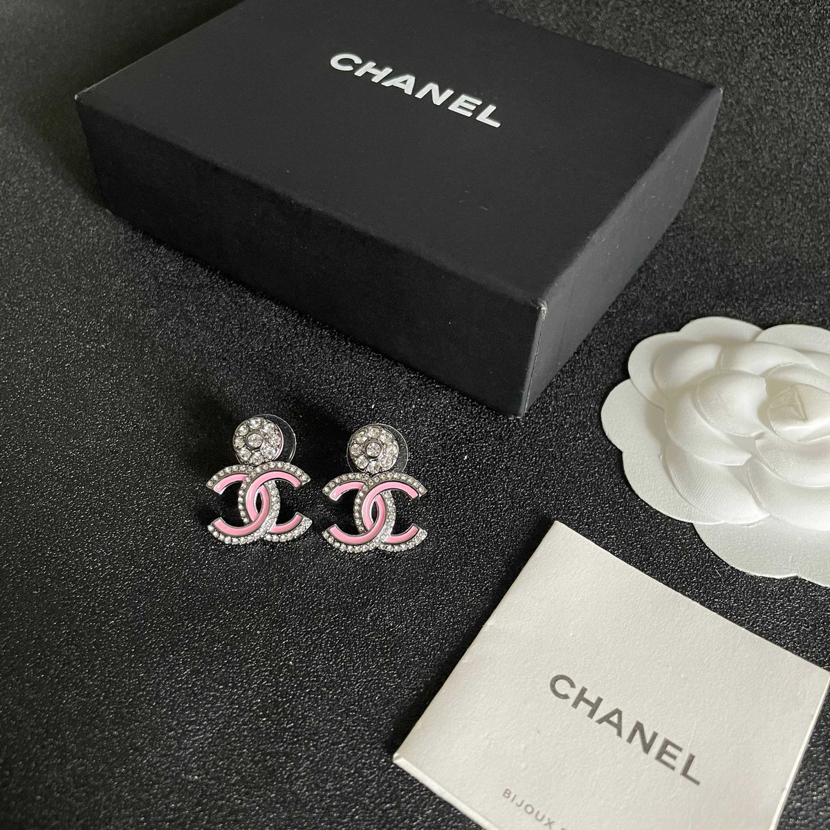 Martin Graham earrings in polished metal-tone – close-up detail