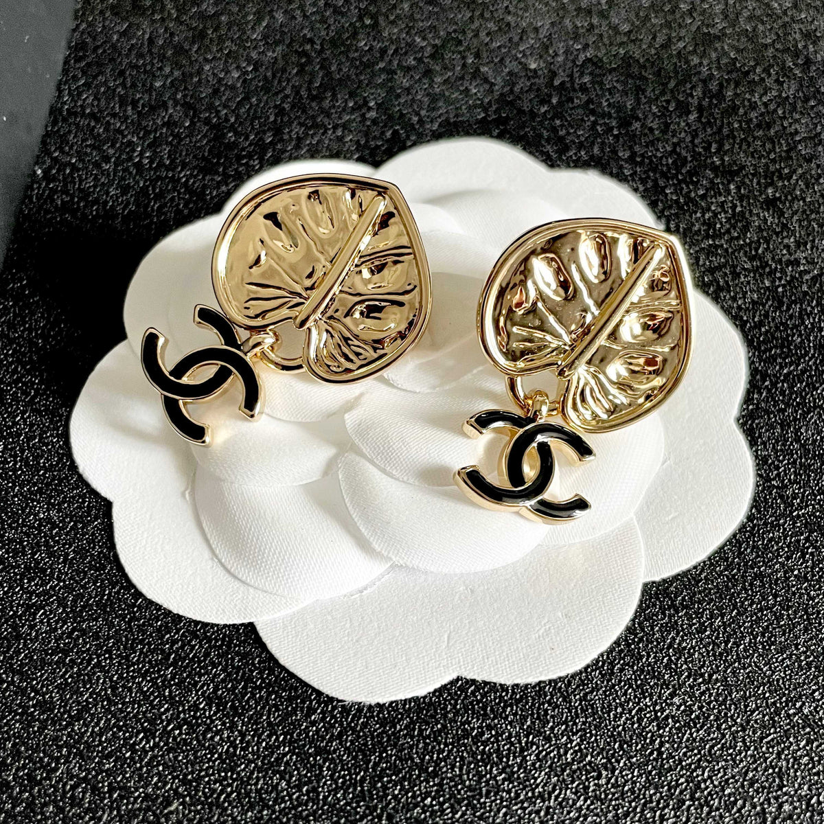 Martin Graham earrings in polished metal-tone – front product view