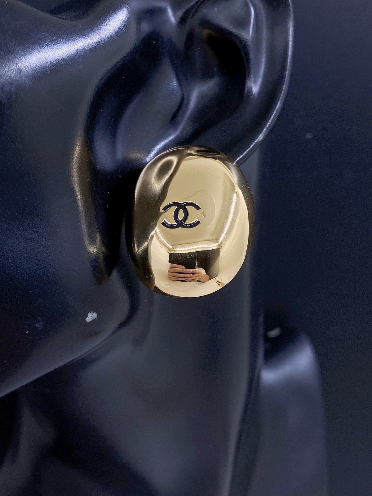 Martin Graham stud earrings in polished metal-tone – front product view