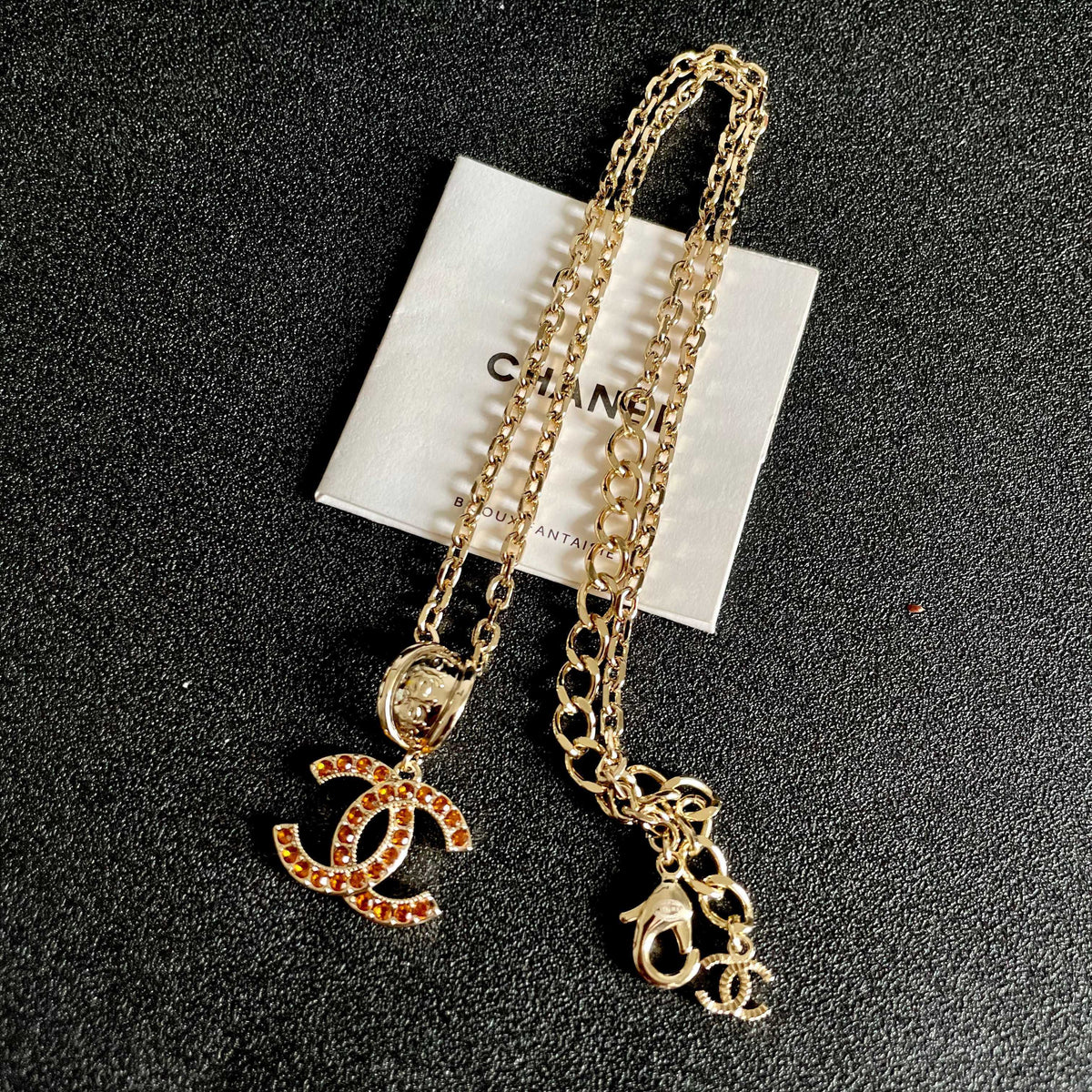 Martin Graham pendant necklace in polished metal-tone – detail view