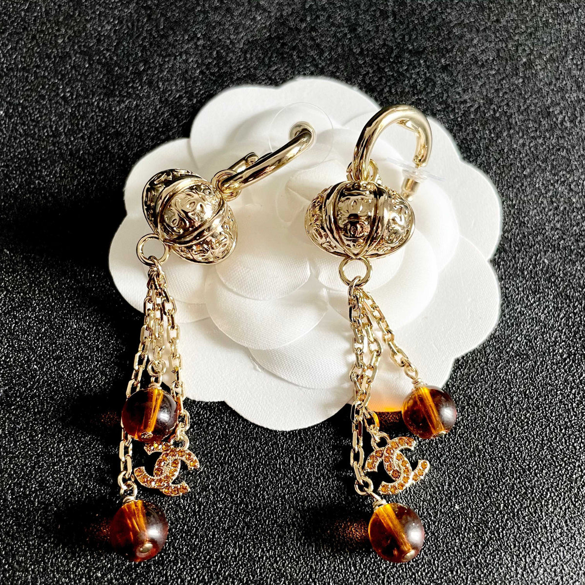 Martin Graham earrings in polished metal-tone – front product view