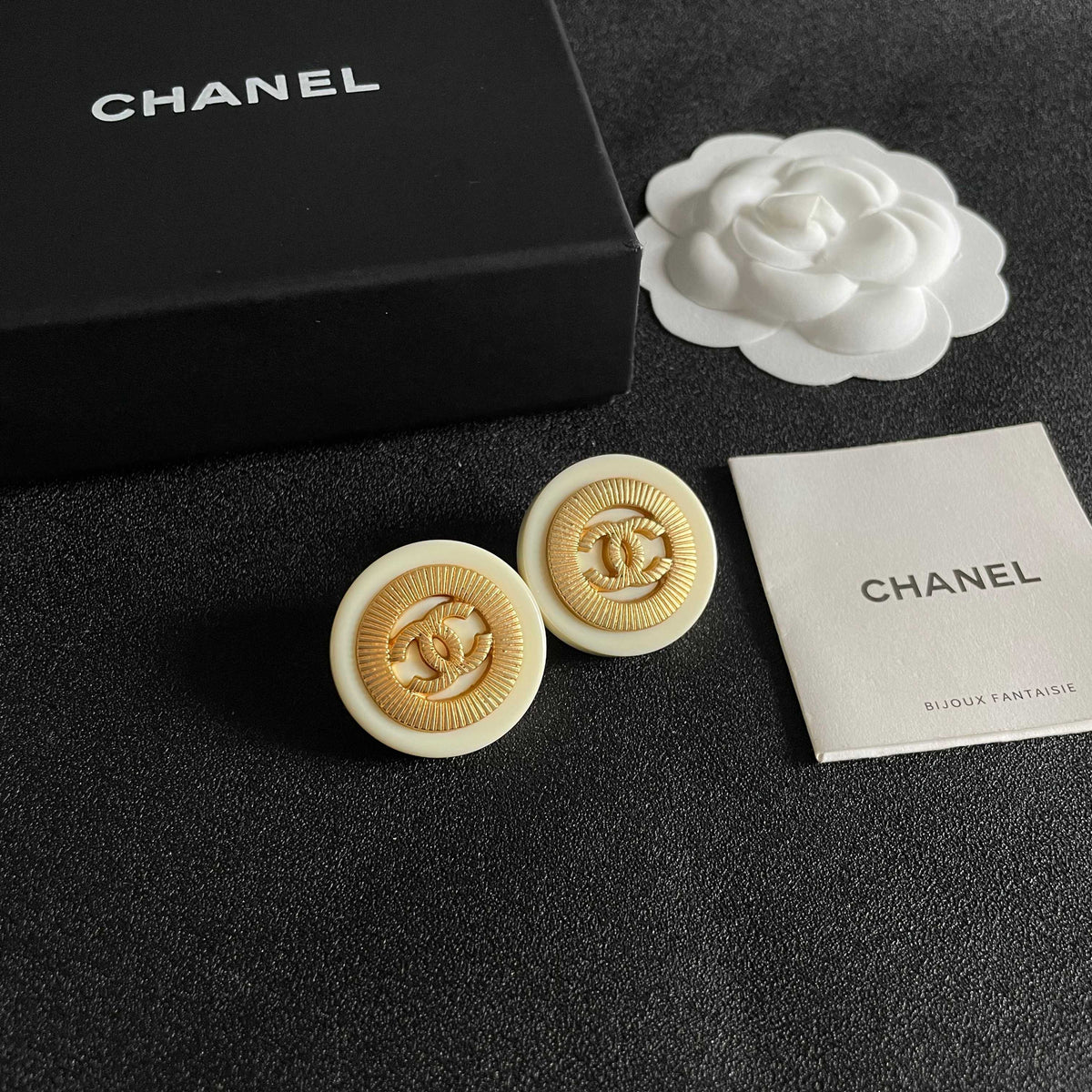 Martin Graham stud earrings in polished metal-tone – styled product view