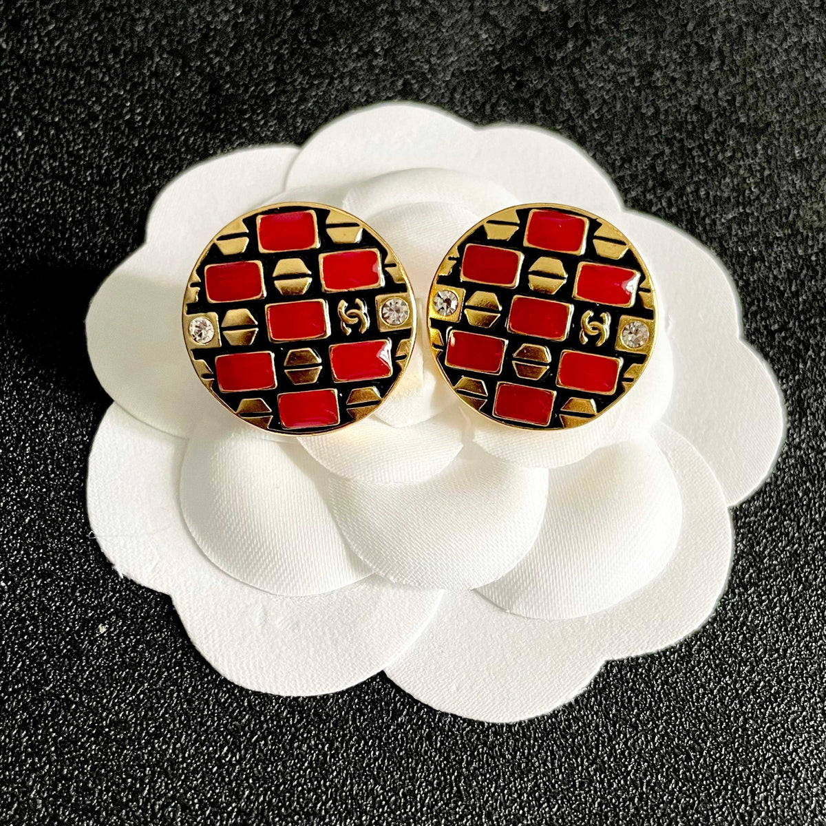 Martin Graham stud earrings in polished metal-tone – front product view