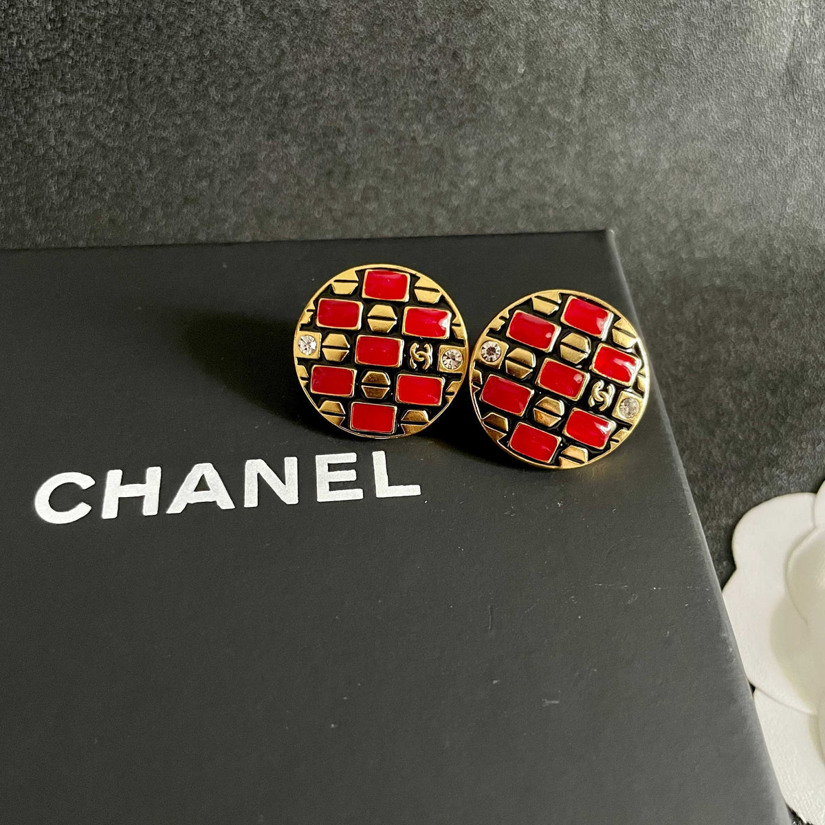 Martin Graham stud earrings in polished metal-tone – detail view