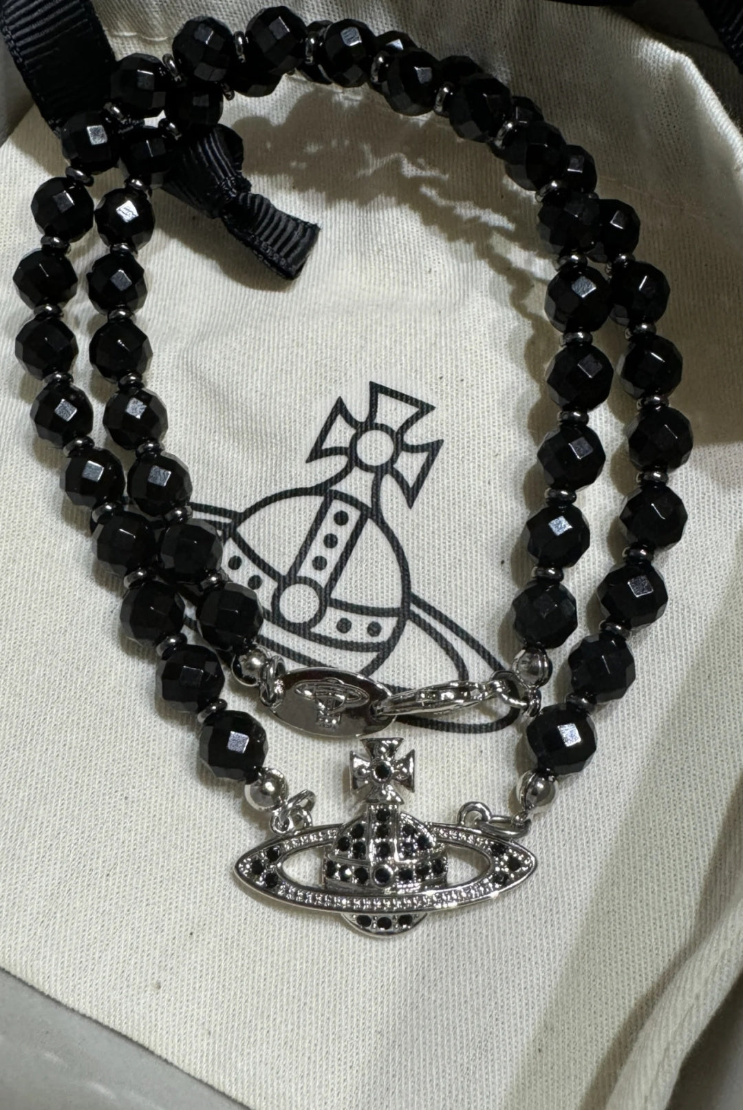Martin Graham jewelry accessory in polished metal-tone – close-up detail