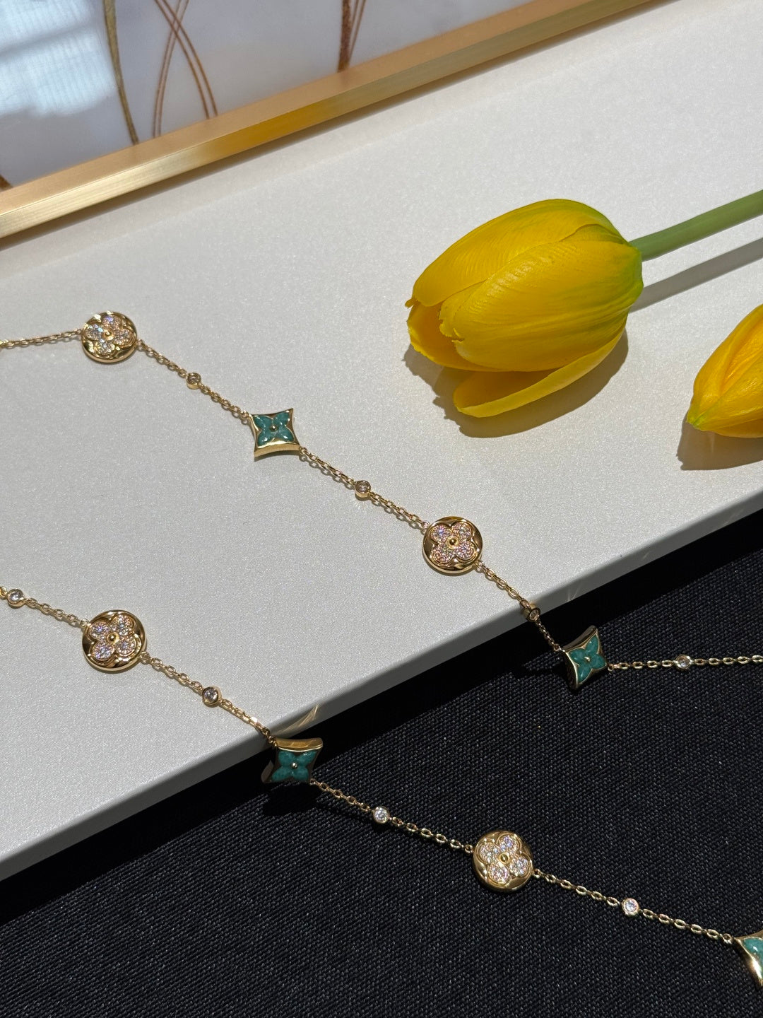 Martin Graham pendant necklace in polished metal-tone – close-up detail